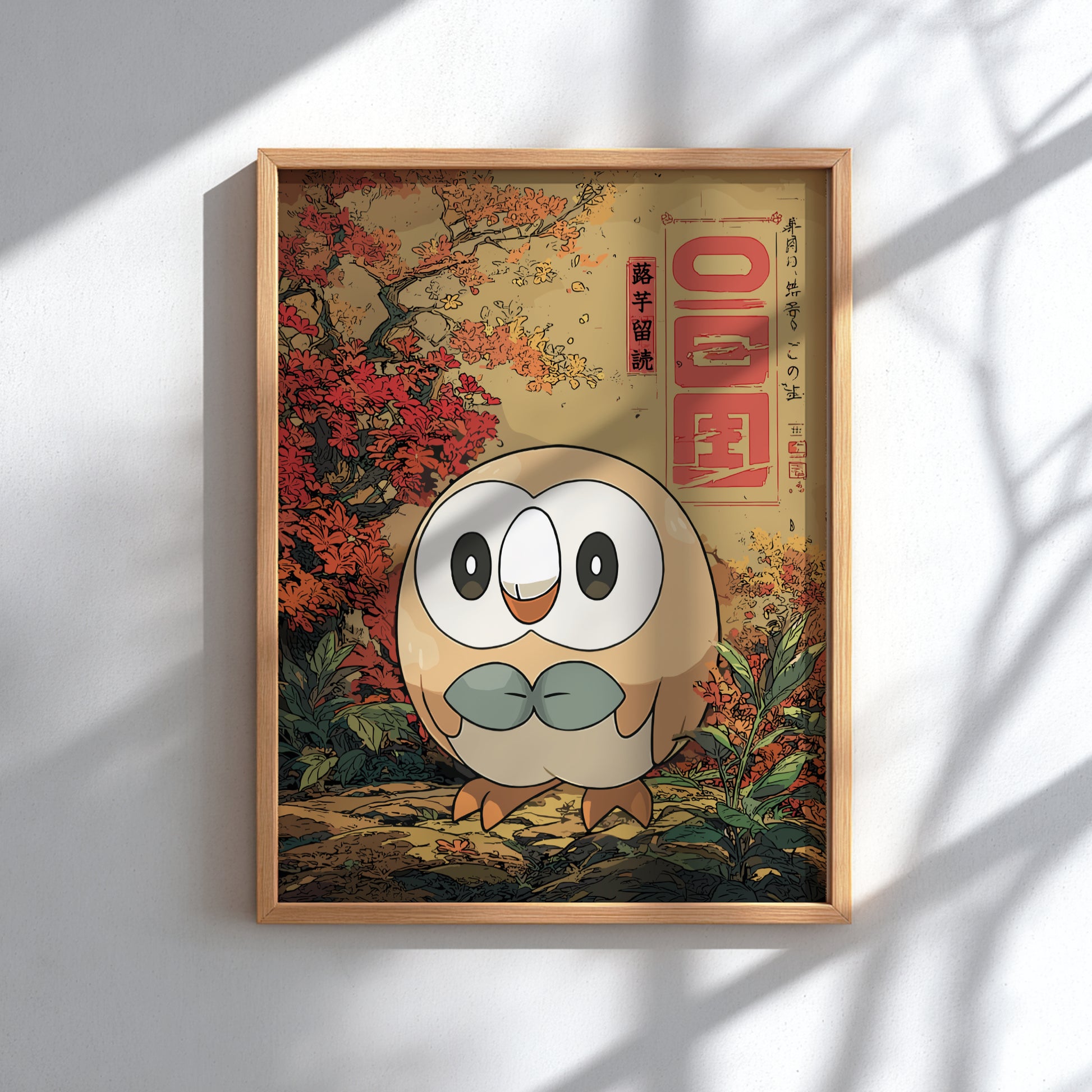 Framed artwork with Rowlet Pokemon character and autumn scenery