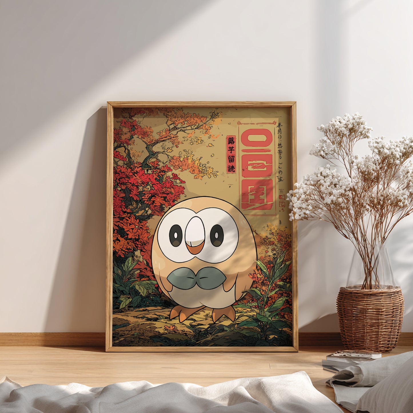 Framed artwork of Rowlet Pokemon with autumn scenery in a room.