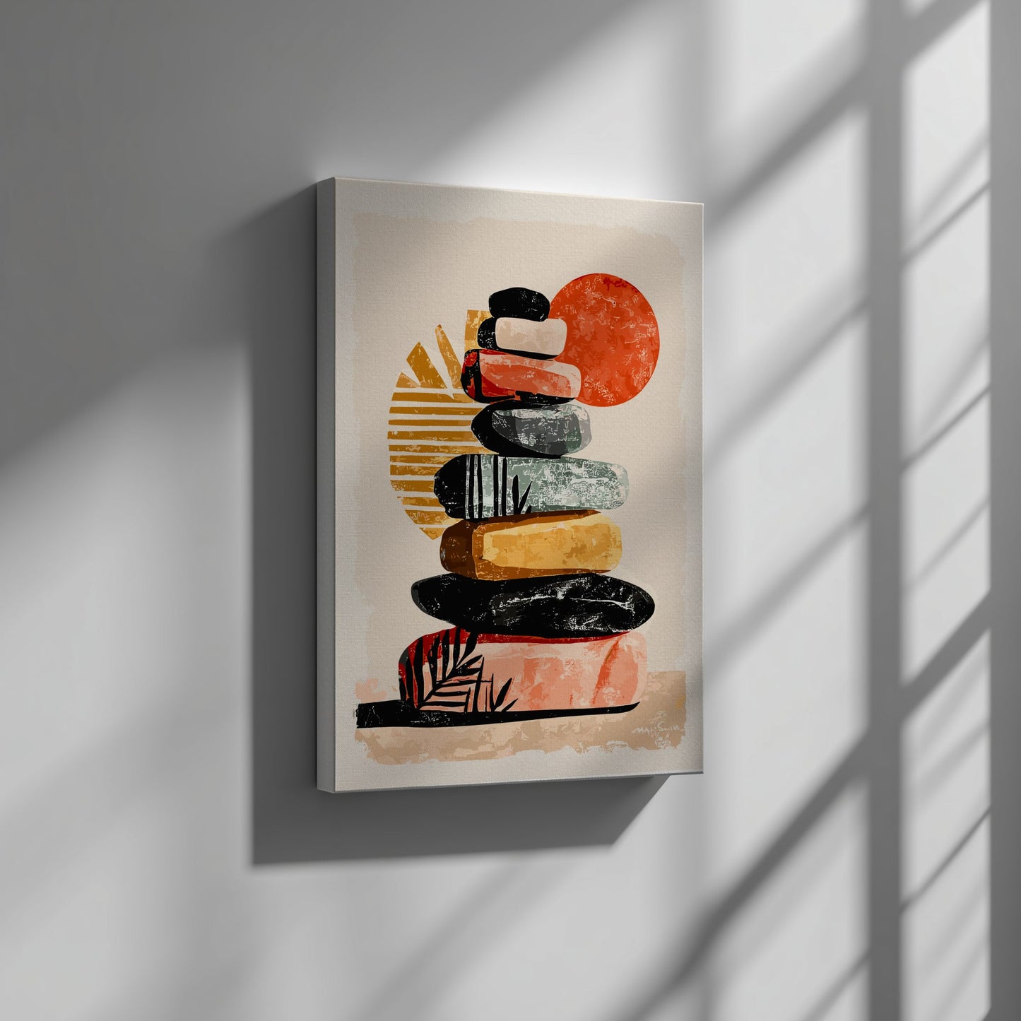 Abstract canvas print of stacked stones and a sun on a beige background, hanging on a wall.
