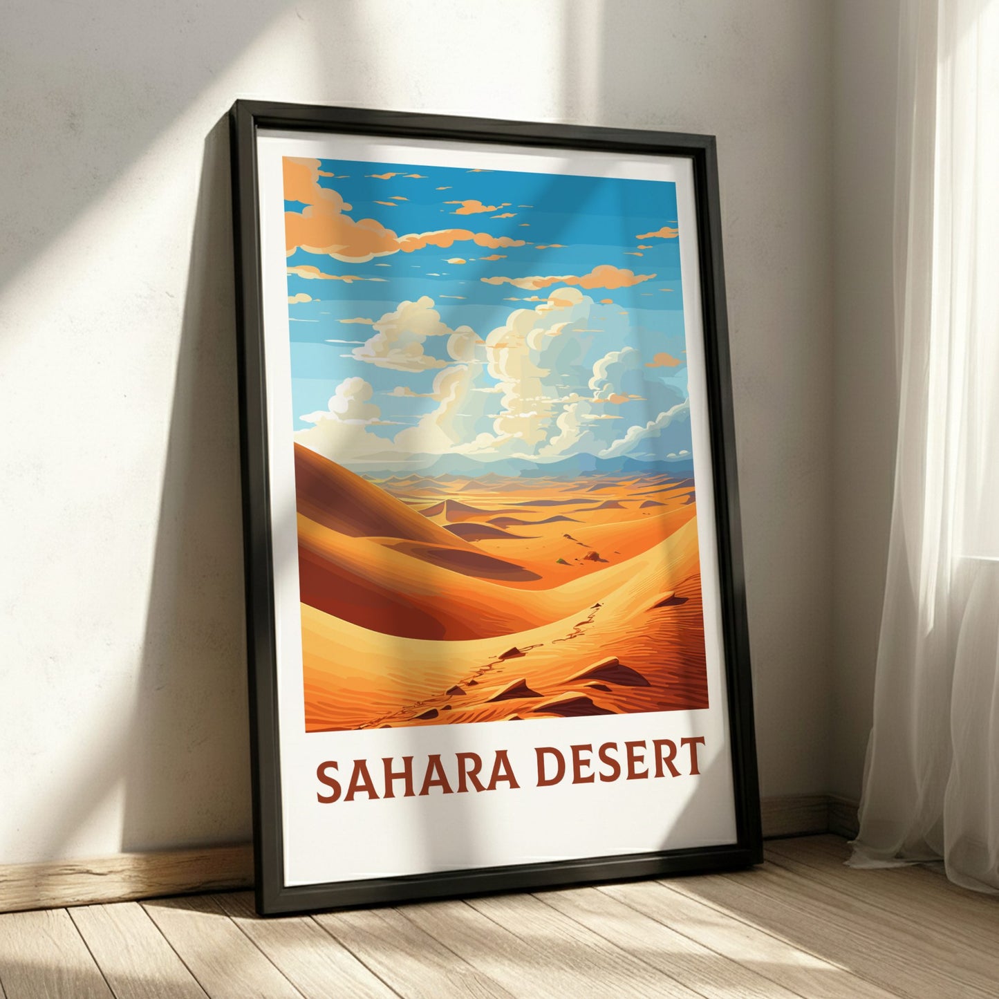 Framed poster of the Sahara Desert with a desert landscape and blue sky.