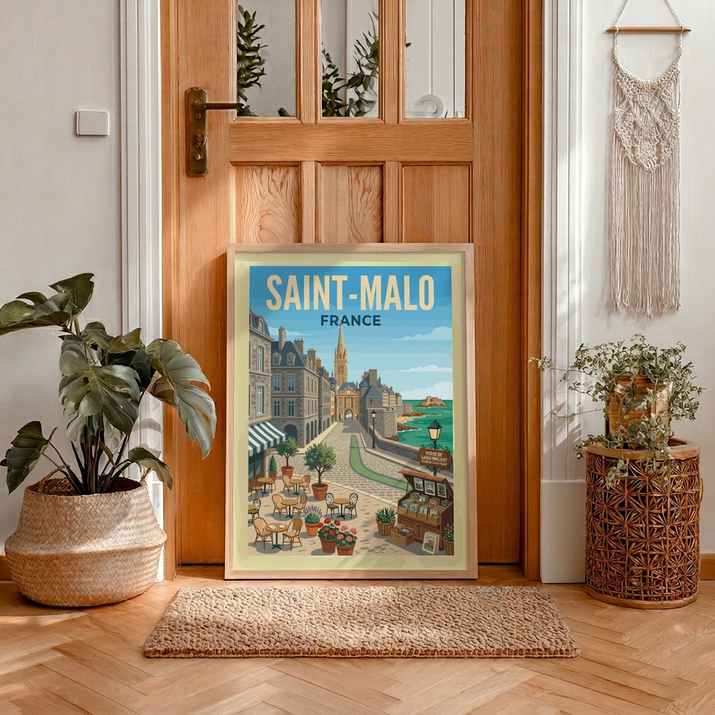 Saint Malo, France travel poster featuring a cobblestone street, historic buildings, and the sea.