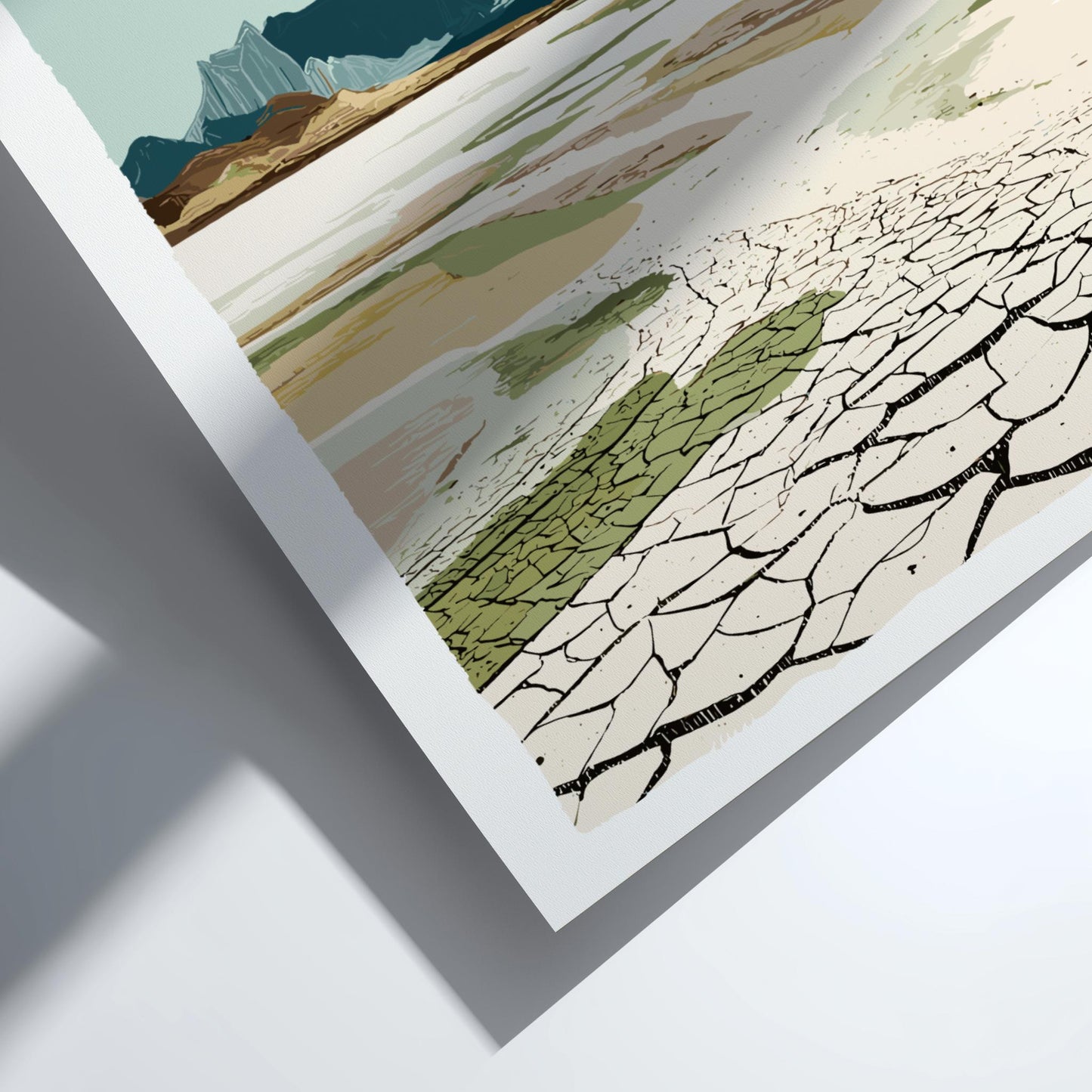 Artistic depiction of a landscape with cracked earth and mountains on a white background