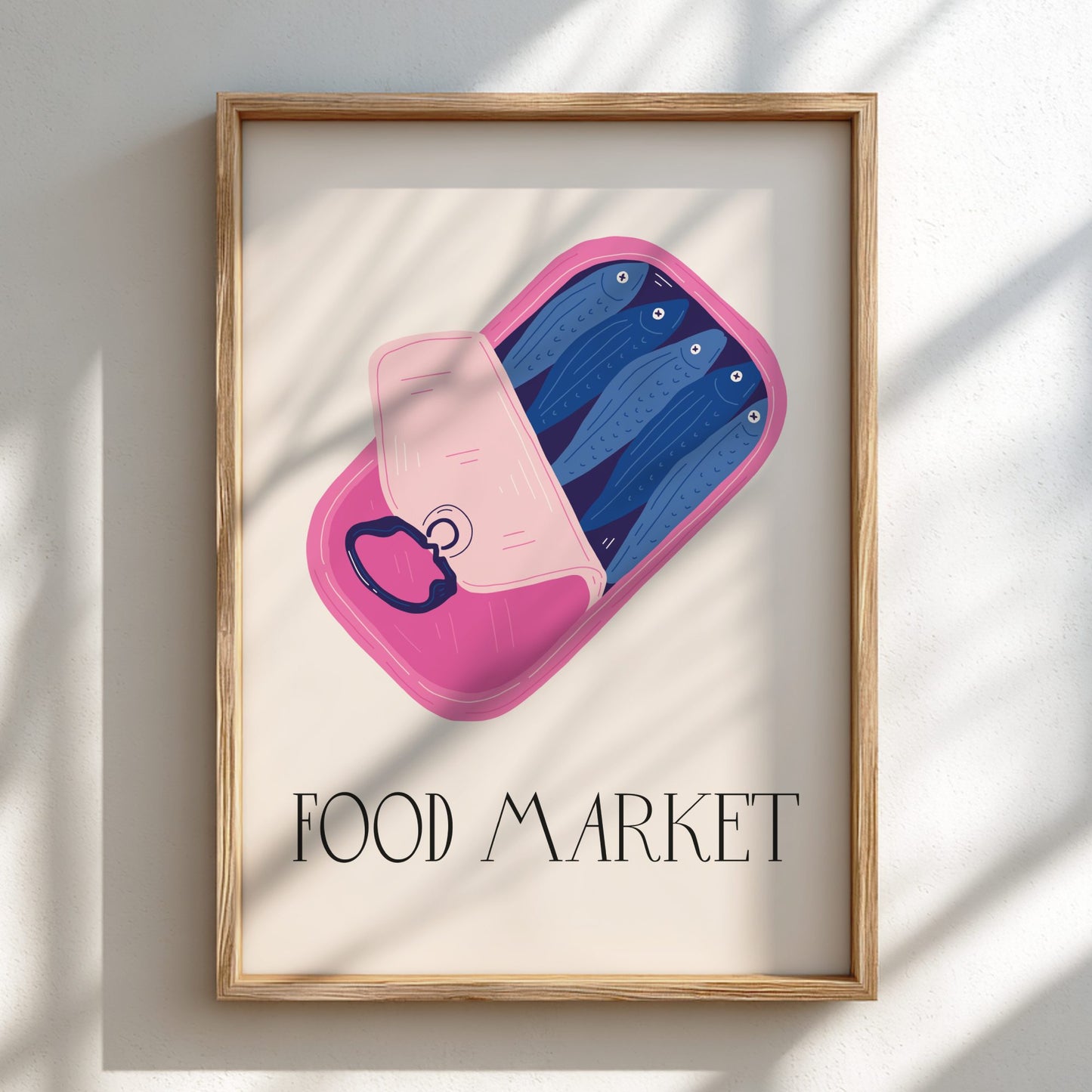 Framed artwork of a pink and blue container with 'FOOD MARKET' text on a light background