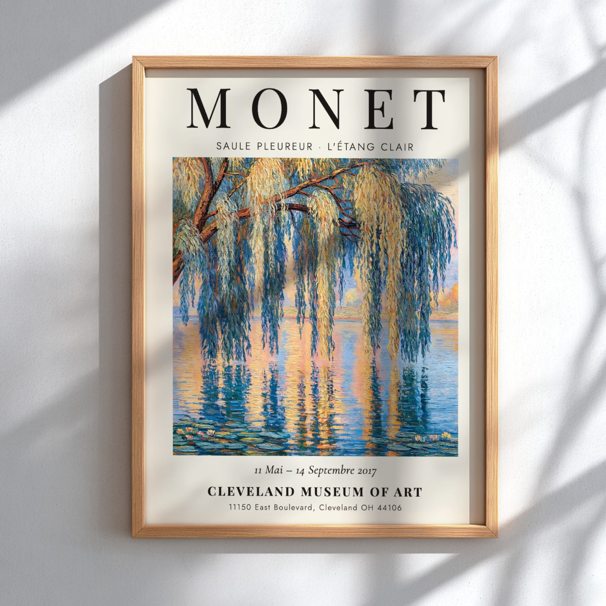 Monet inspired poster featuring a willow tree and water reflections in soft blues and greens