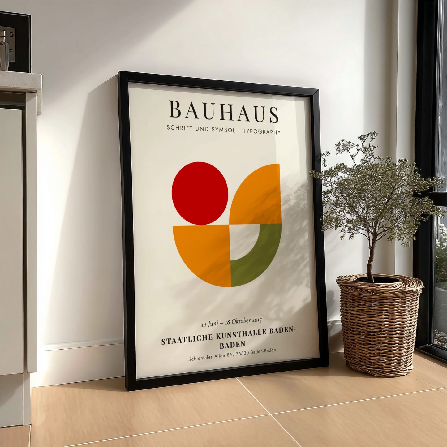 Bauhaus poster featuring geometric shapes in red, orange, and green, showcasing modern design elements.