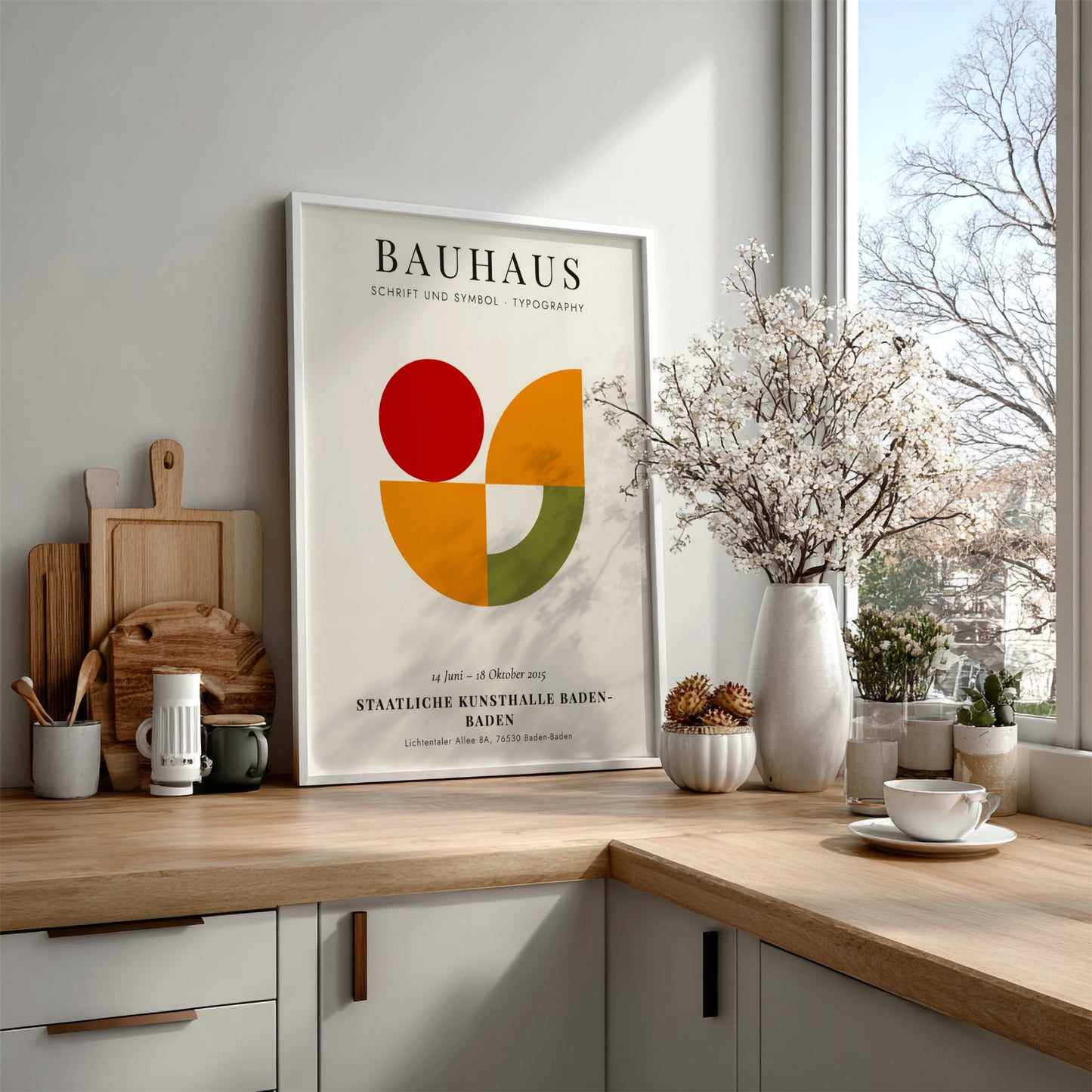 Bauhaus poster featuring geometric shapes in red, orange, and green, showcasing modern design elements.