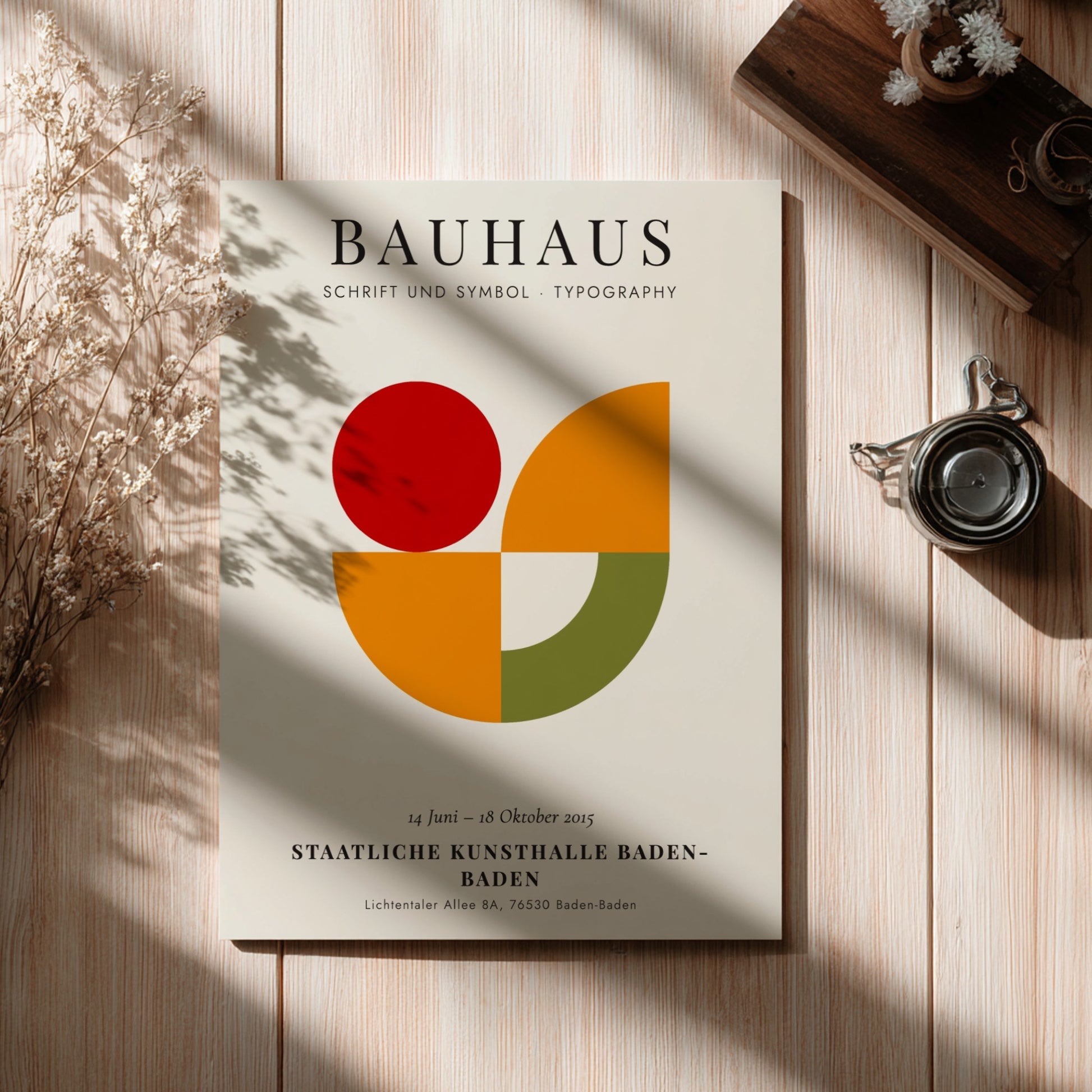 Bauhaus poster featuring geometric shapes in red, orange, and green, showcasing modern design elements.