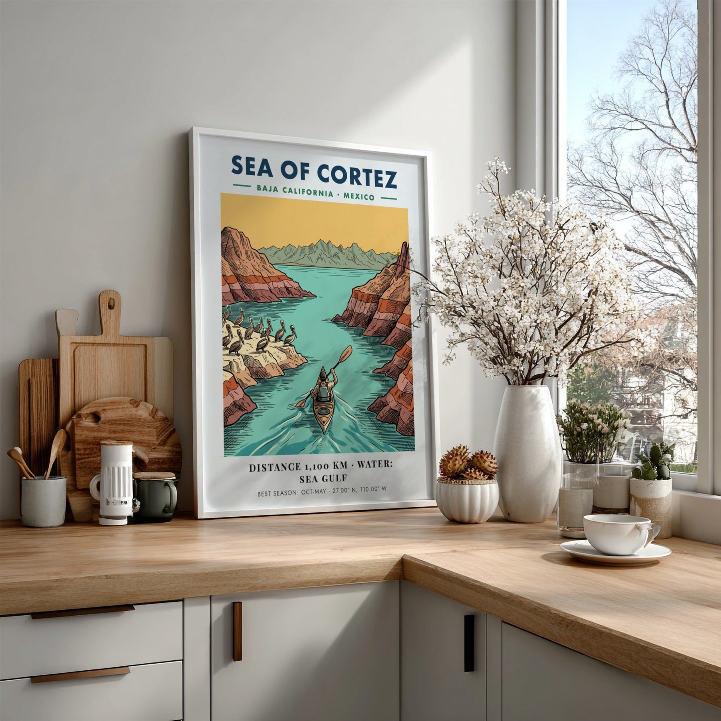 Poster featuring a kayaker in the Sea of Cortez near Baja California cliffs.