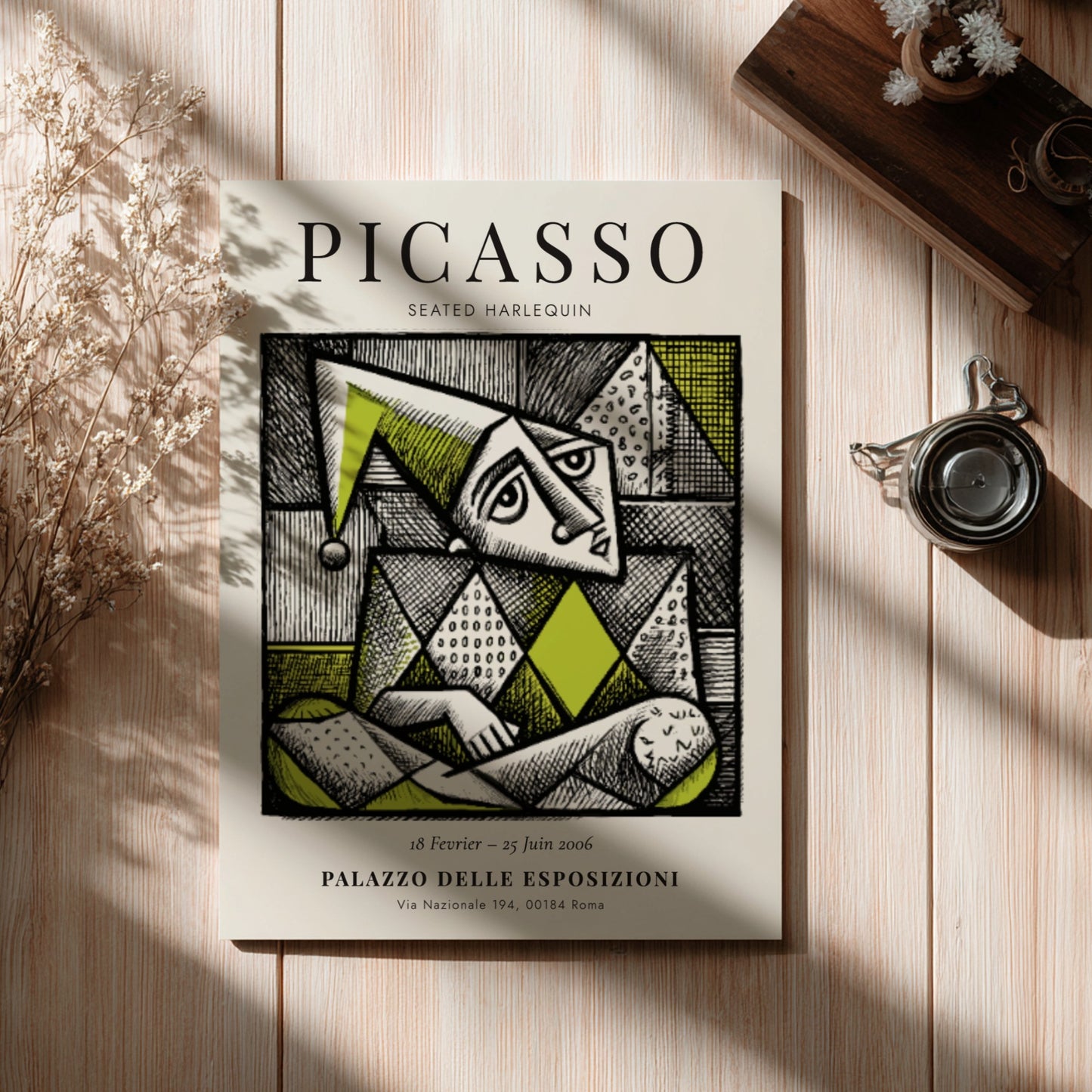 Seated Harlequin poster showcasing Picasso inspired geometric design in green and black.