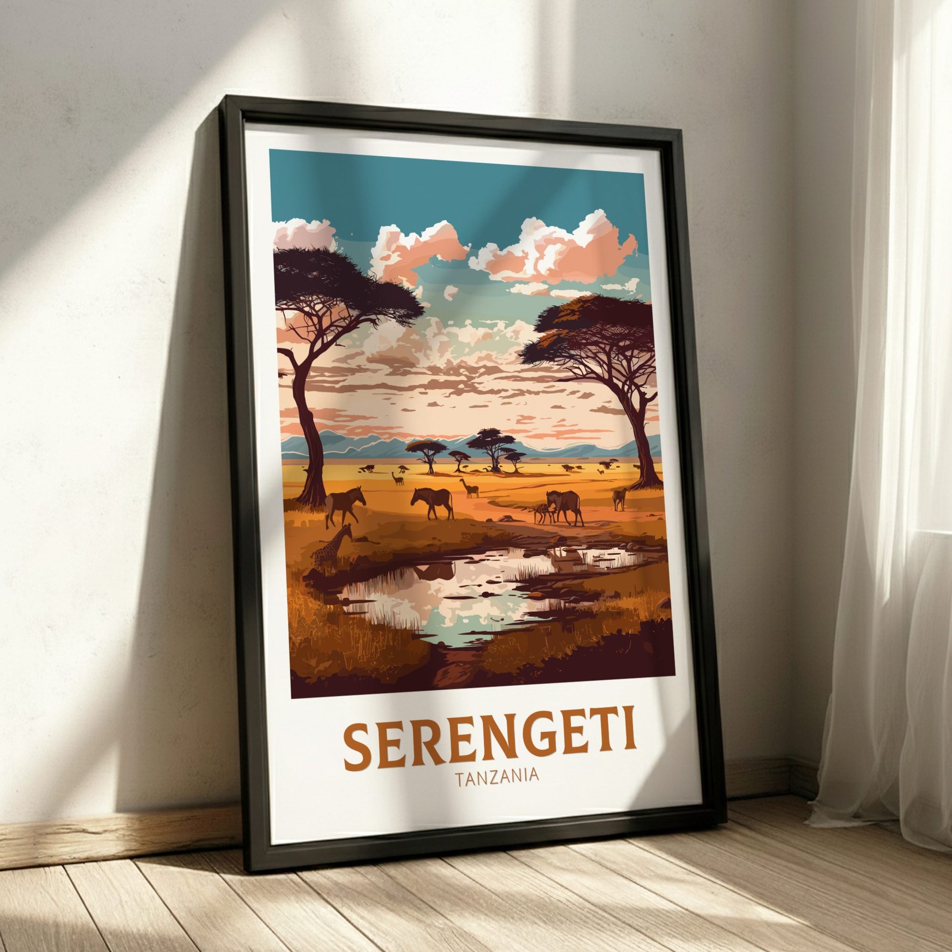 Framed poster of the Serengeti landscape with trees and animals on a wall.