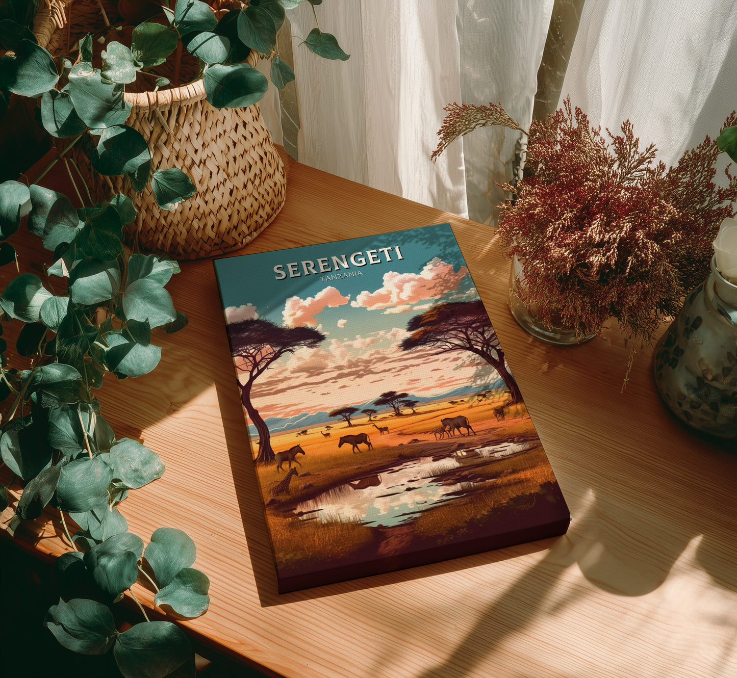 Book titled 'Serengeti' on a wooden table with plants around