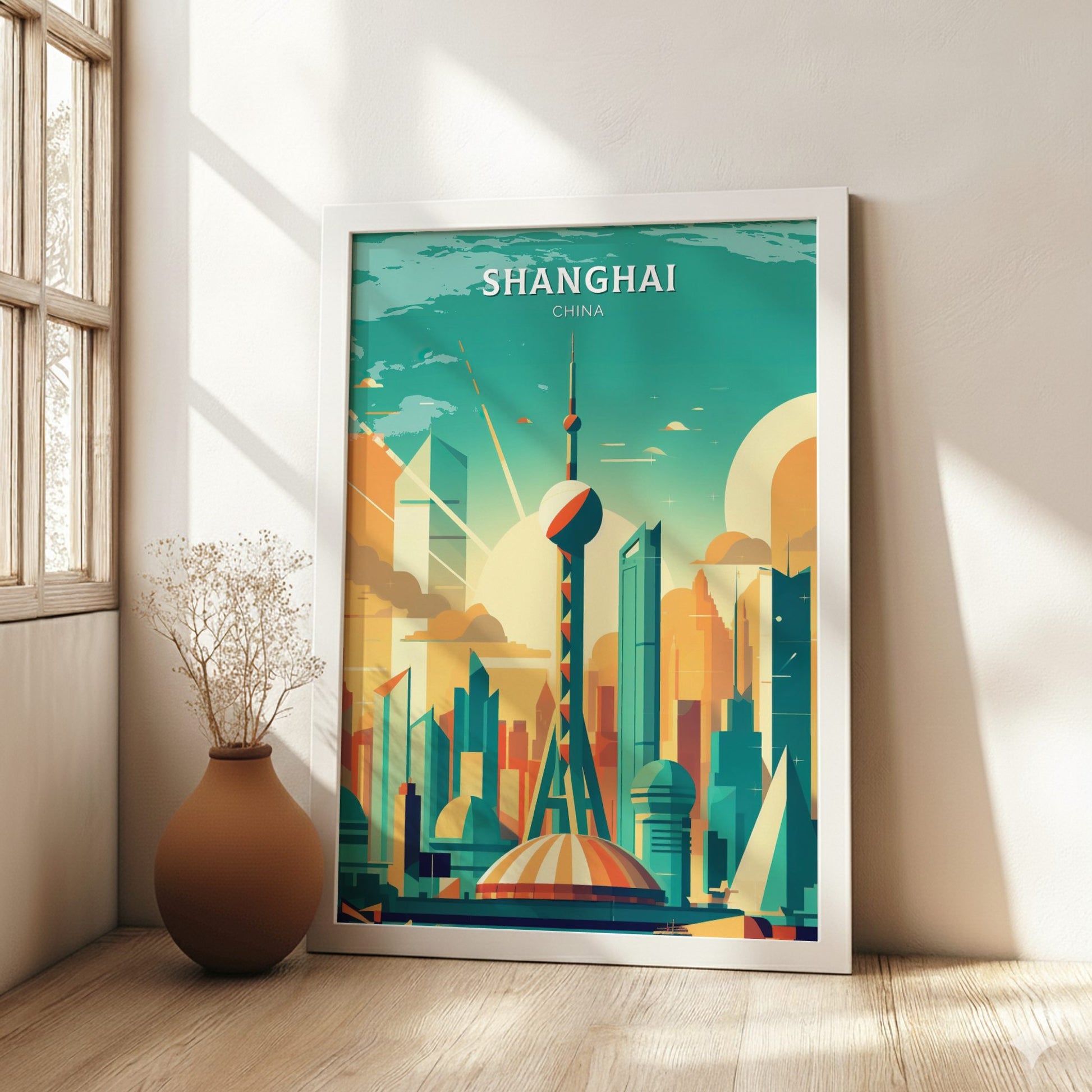 Framed poster of Shanghai, China in a room with a vase and plant.
