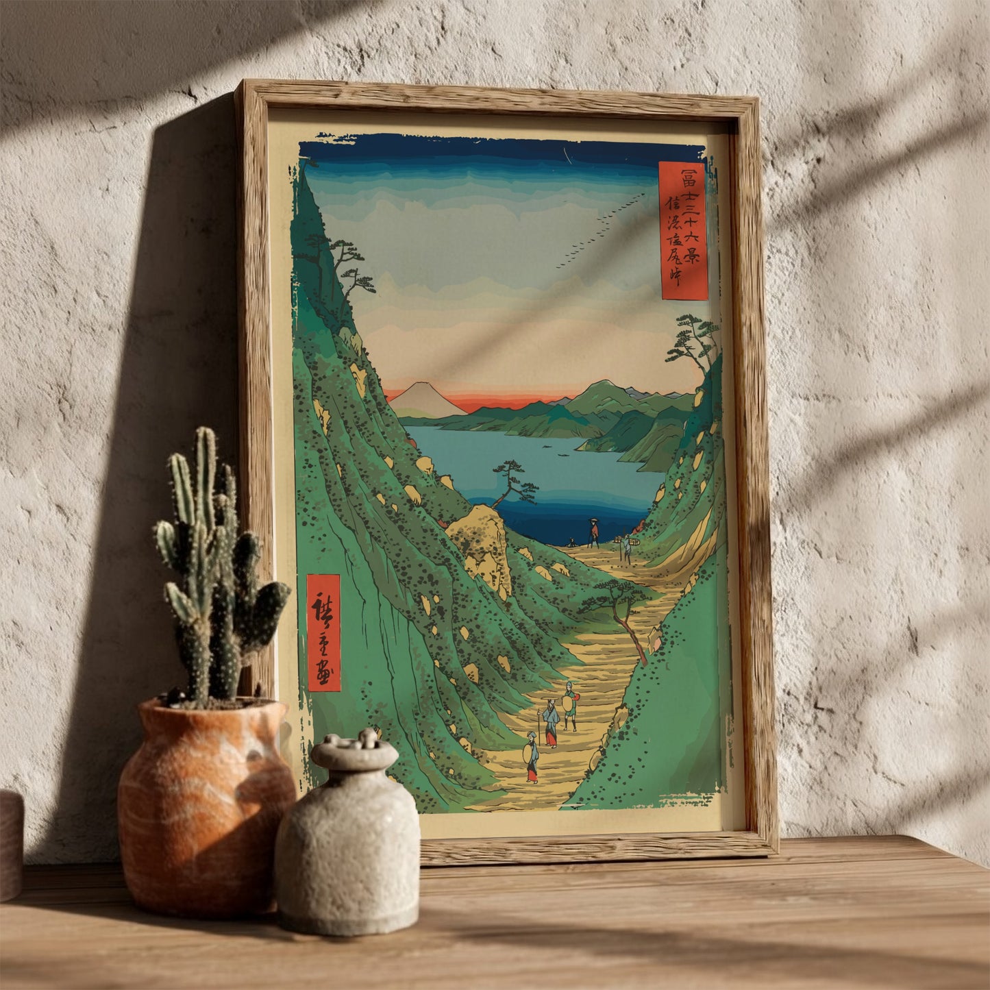 Shiojiri Pass poster featuring a Japanese landscape with a mountain path, lake, and Mount Fuji in Ukiyo-e