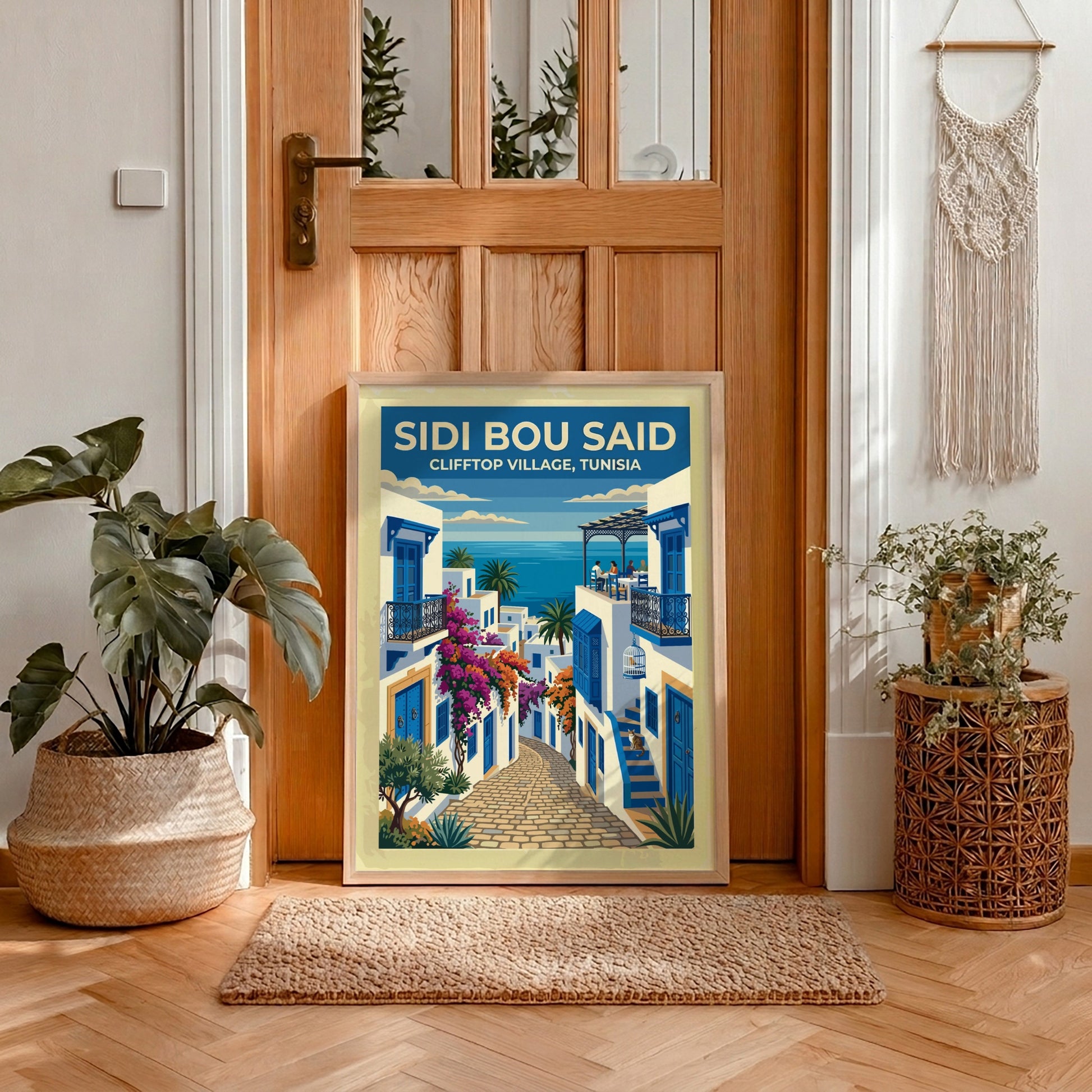 Travel poster of Sidi Bou Said featuring white buildings, blue doors, and flowers.