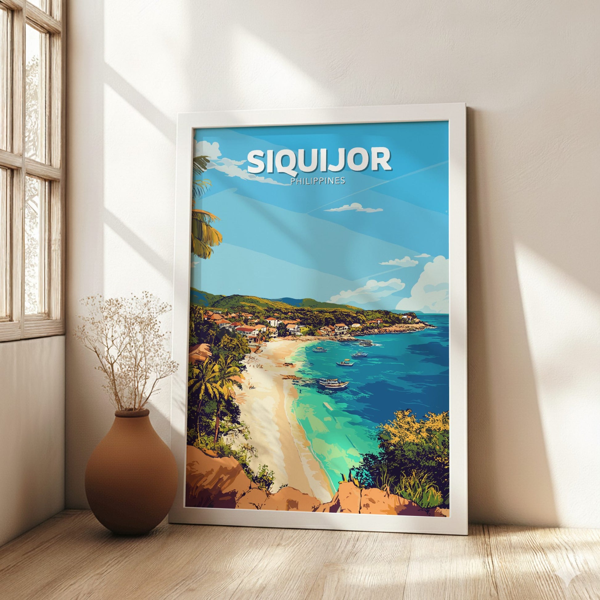 Framed artwork of a beach scene with 'SIQUIJOR' text in a bright room.