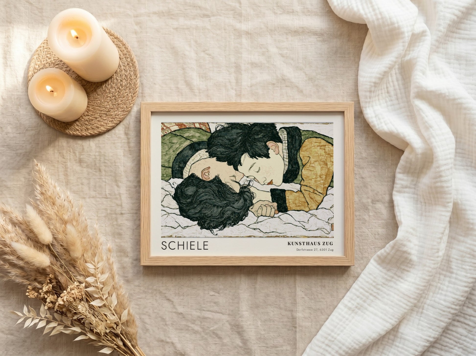 Wall art poster featuring Egon Schiele illustration of two lovers in a wooden frame.