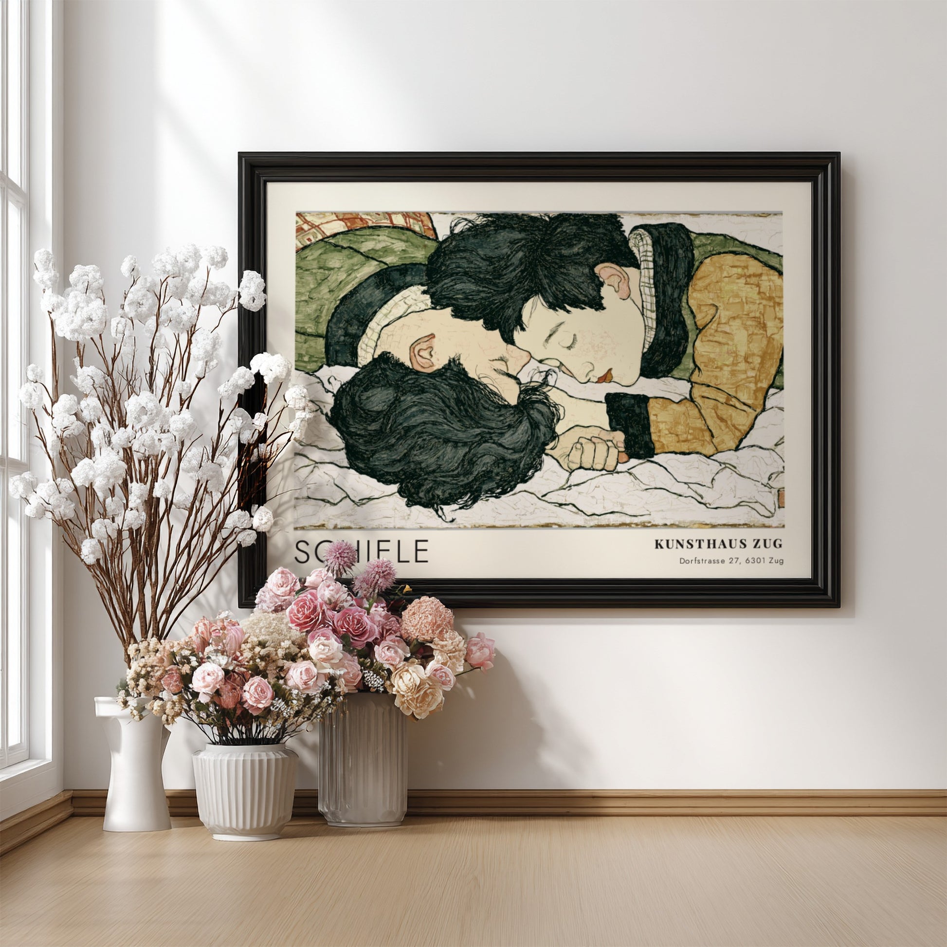 Wall art poster featuring Egon Schiele illustration of two lovers in a wooden frame.