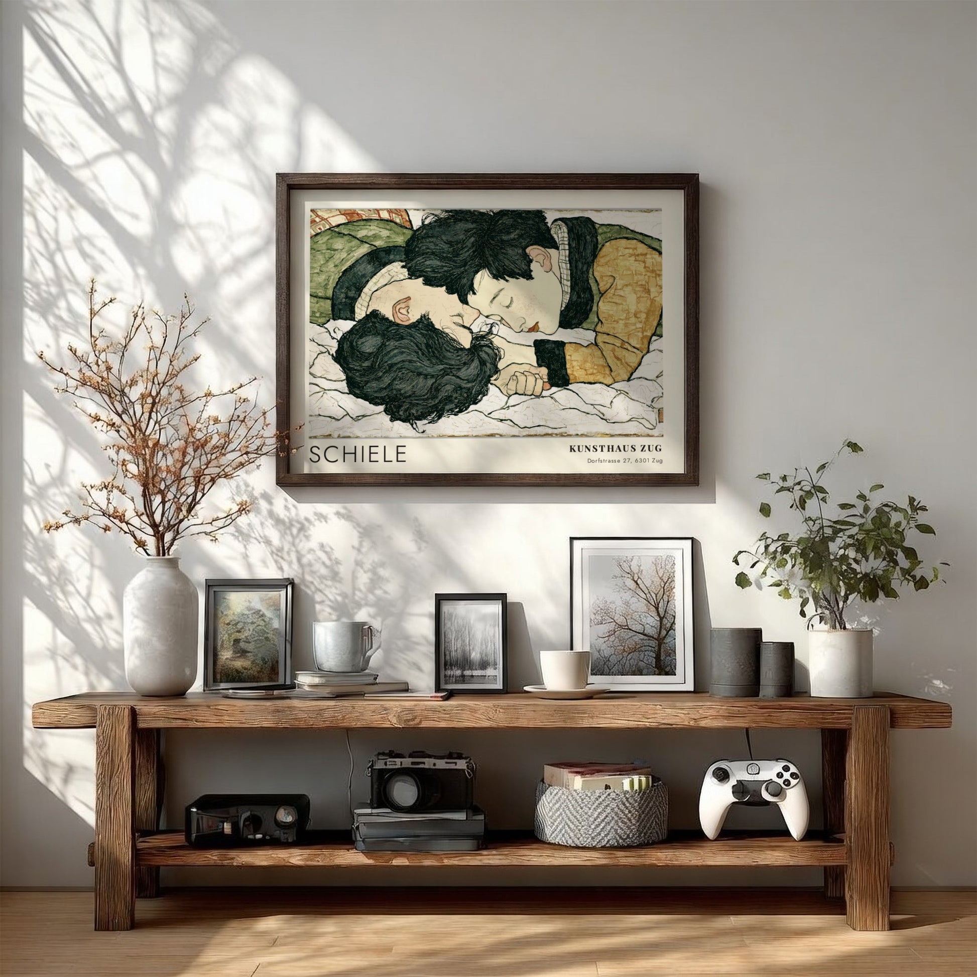 Wall art poster featuring Egon Schiele illustration of two lovers in a wooden frame.