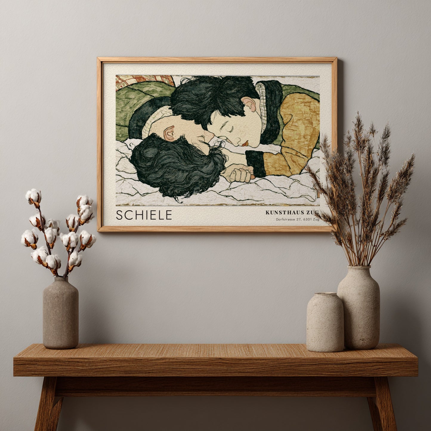 Wall art poster featuring Egon Schiele illustration of two lovers in a wooden frame.
