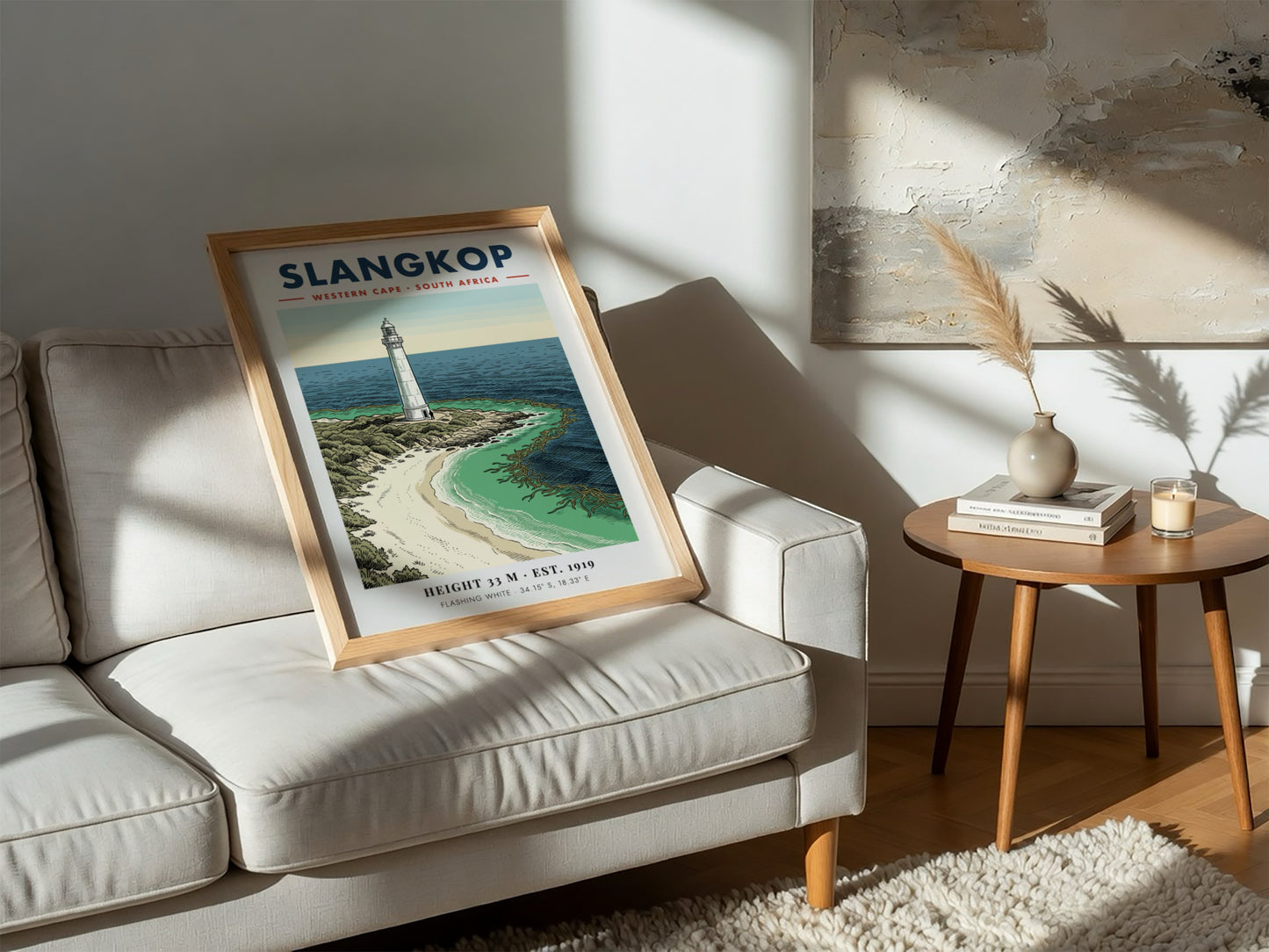 Slangkop Lighthouse poster featuring a white tower on a sandy beach by ocean.