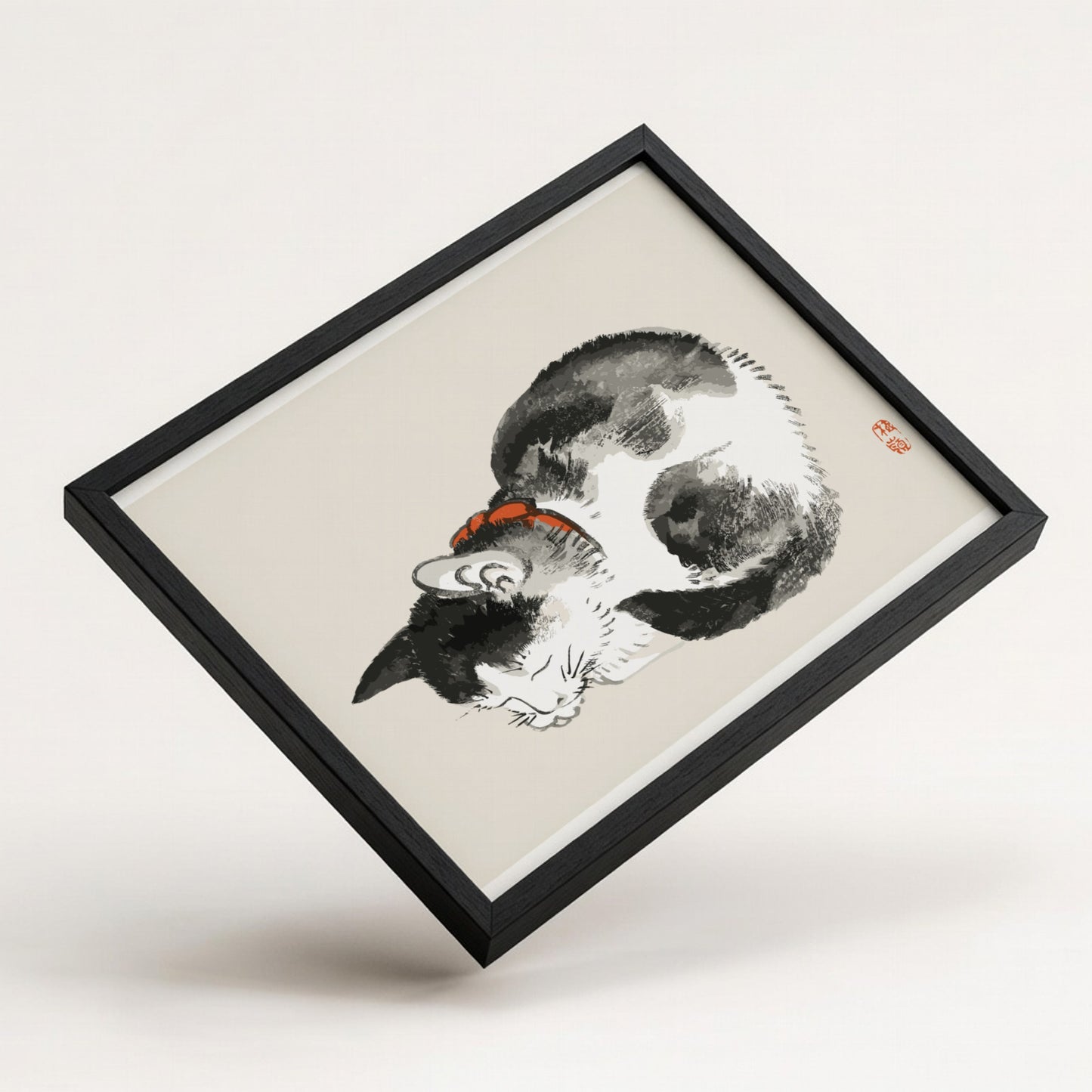 Framed Japanese ink wash drawing of a sleeping black and white cat with a red collar, by Kono Bairei.