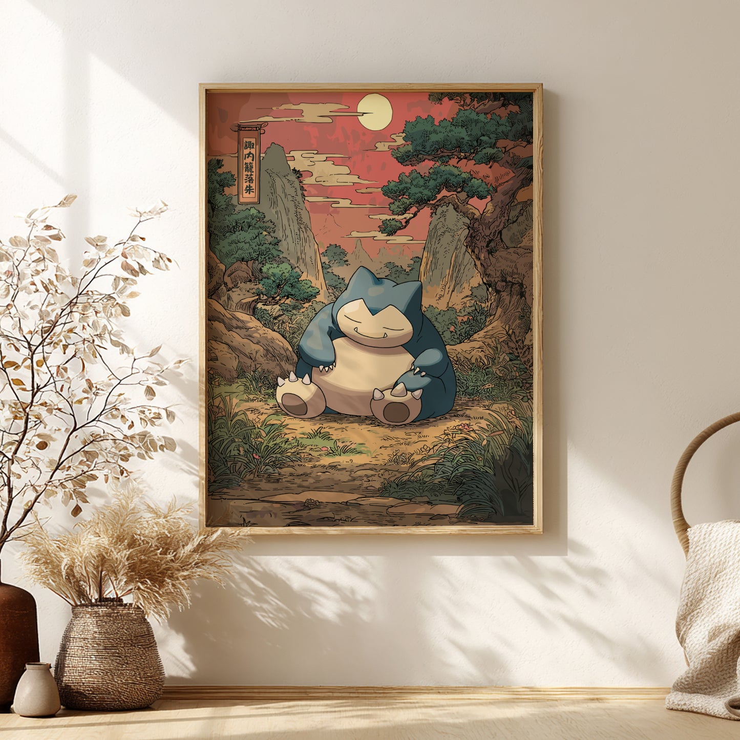 Framed artwork of Snorlax Pokemon character sitting on a rock in a natural setting, hanging on a wall.