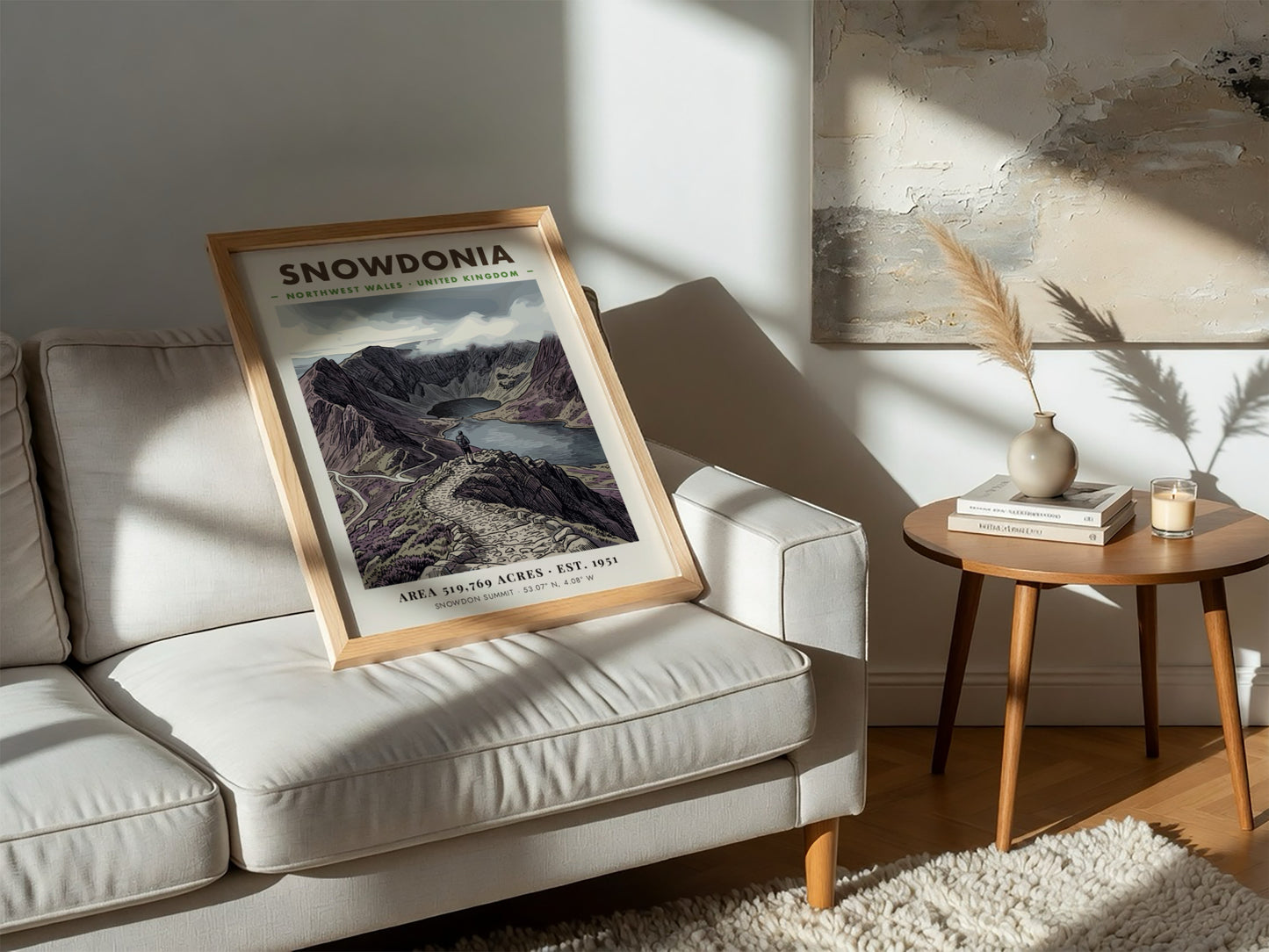 Poster featuring a hiker overlooking the dramatic, purple-toned mountains of Snowdonia, Wales, in
