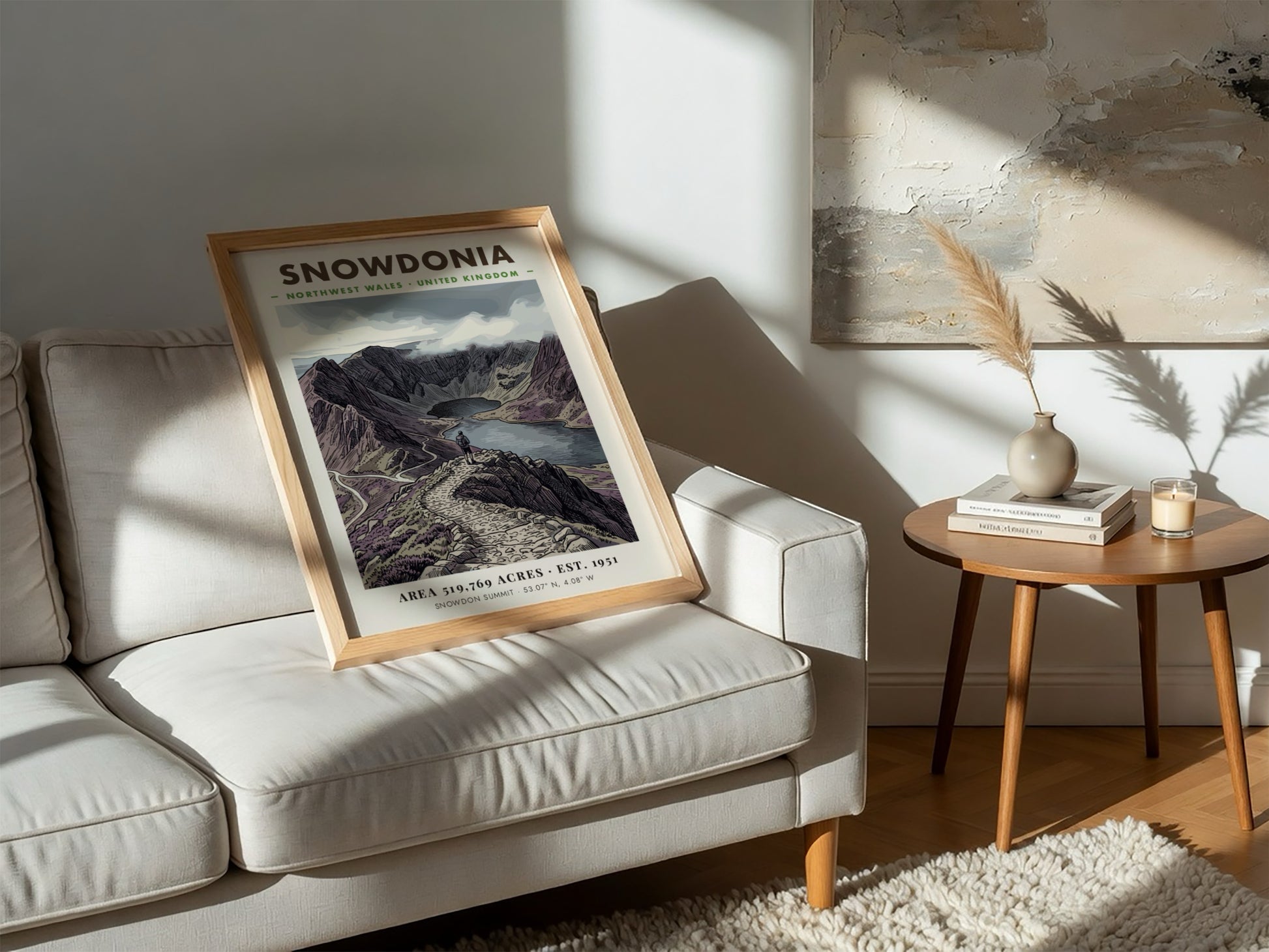 Poster featuring a hiker overlooking the dramatic, purple-toned mountains of Snowdonia, Wales, in