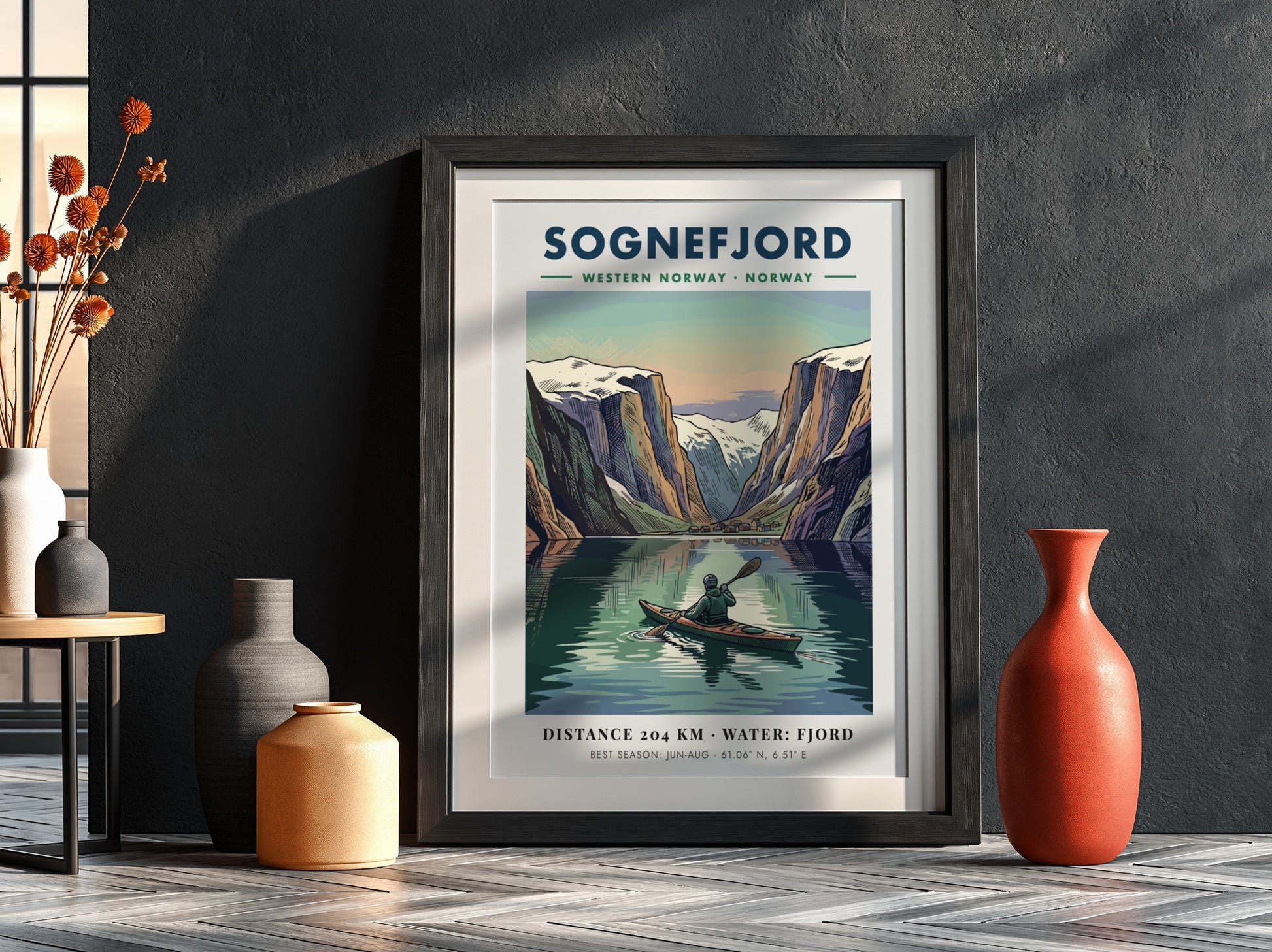 Poster of a kayaker on Sognefjord in Norway surrounded by towering snowy mountain peaks.