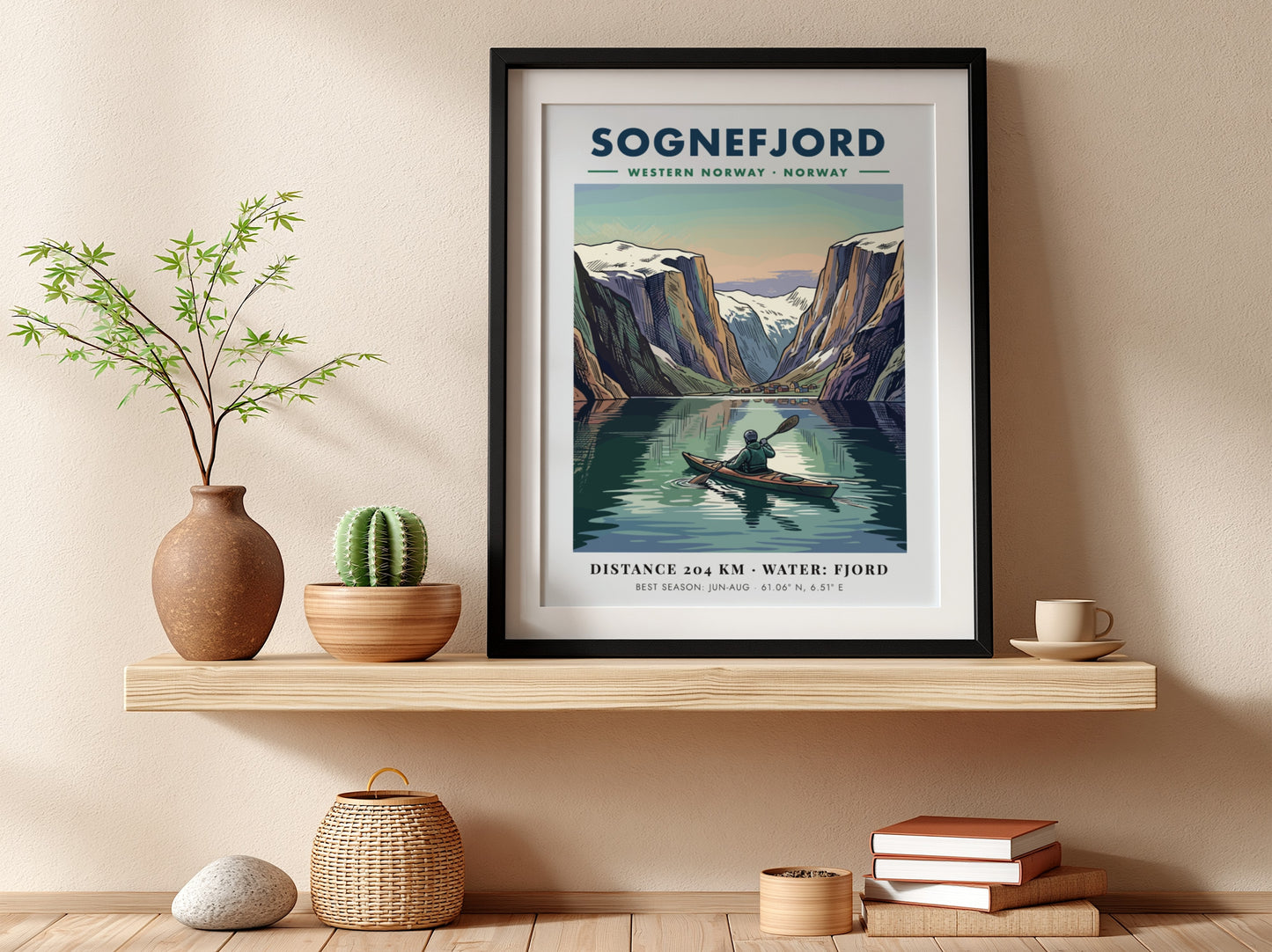 Poster of a kayaker on Sognefjord in Norway surrounded by towering snowy mountain peaks.