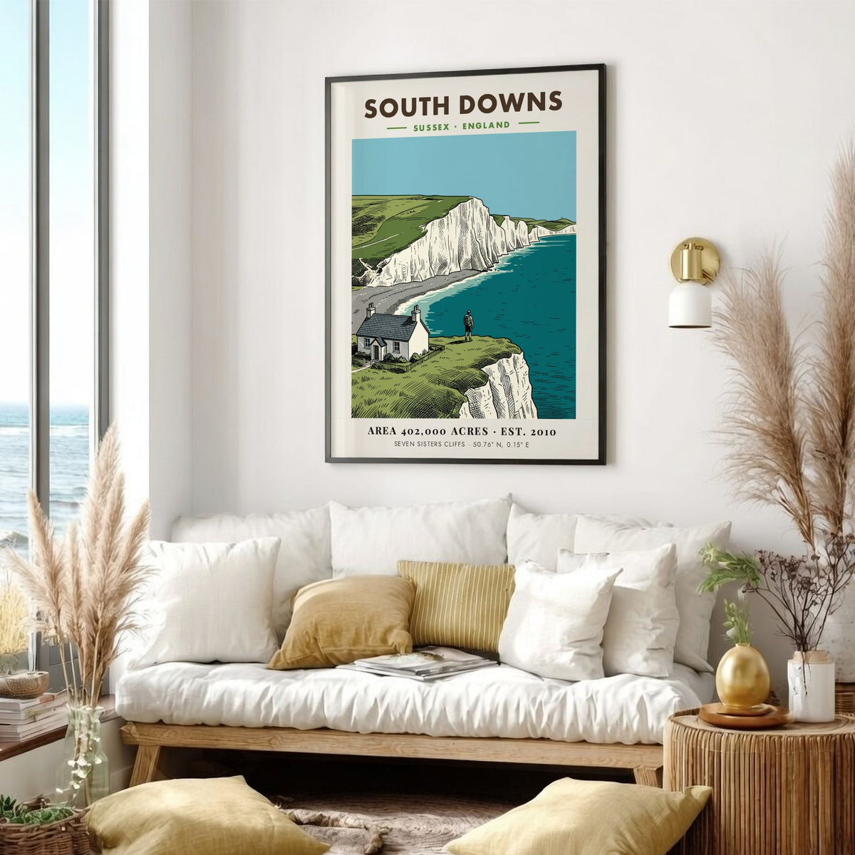 Poster of South Downs National Park featuring white cliffs, a cottage, and hiker.