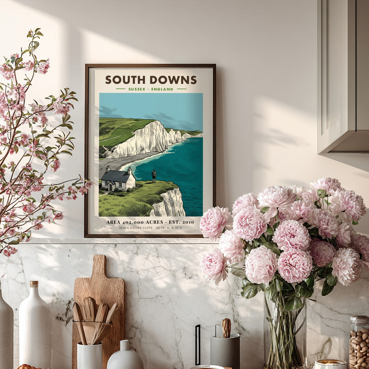 Poster of South Downs National Park featuring white cliffs, a cottage, and hiker.
