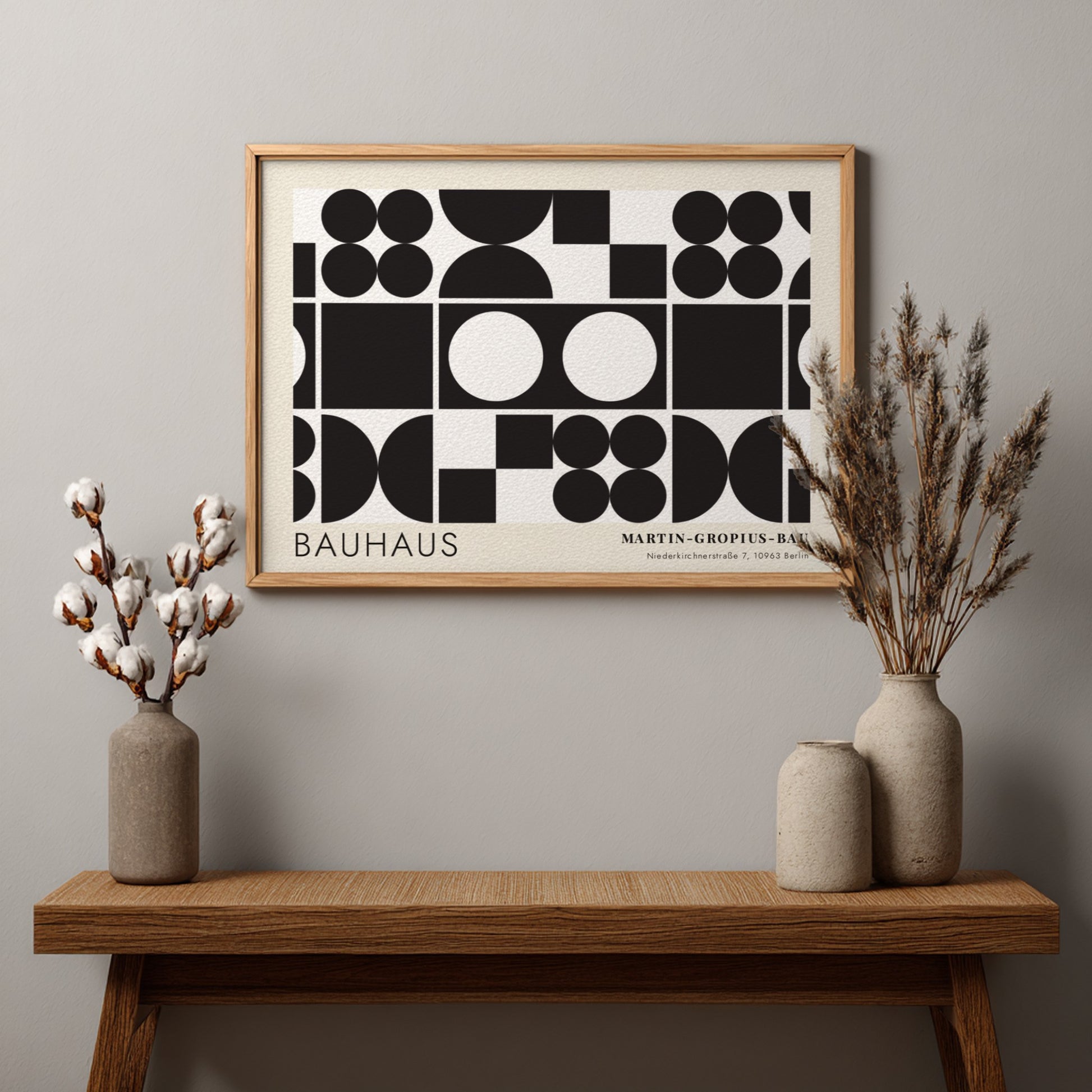 Bauhaus exhibition poster featuring geometric black shapes and white circles by Oskar Schlemmer