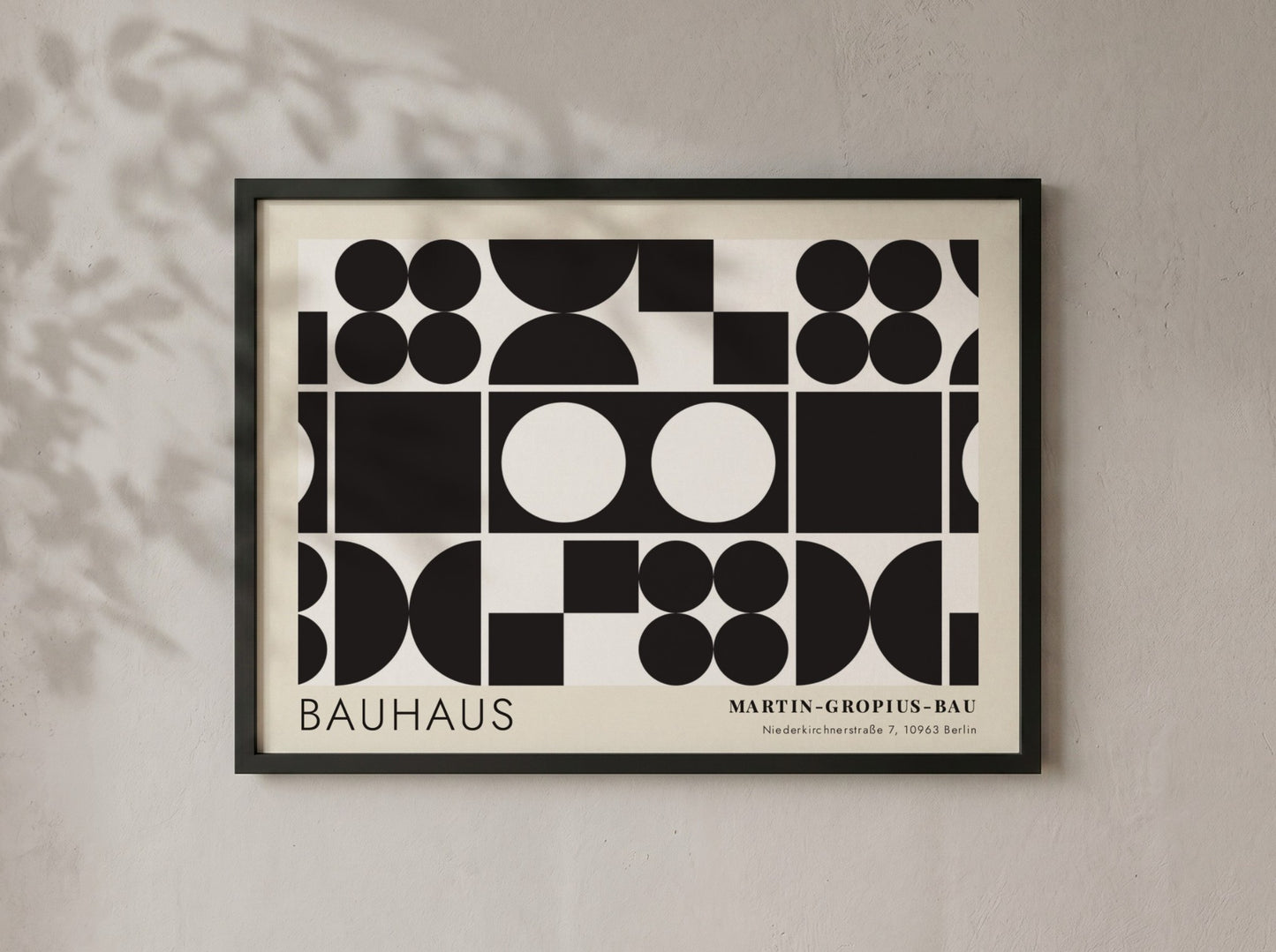 Bauhaus exhibition poster featuring geometric black shapes and white circles by Oskar Schlemmer