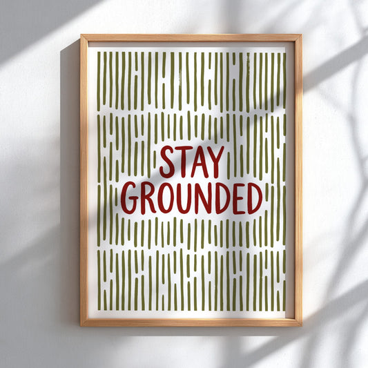 Motivational poster with Stay Grounded text over a pattern of vertical olive lines