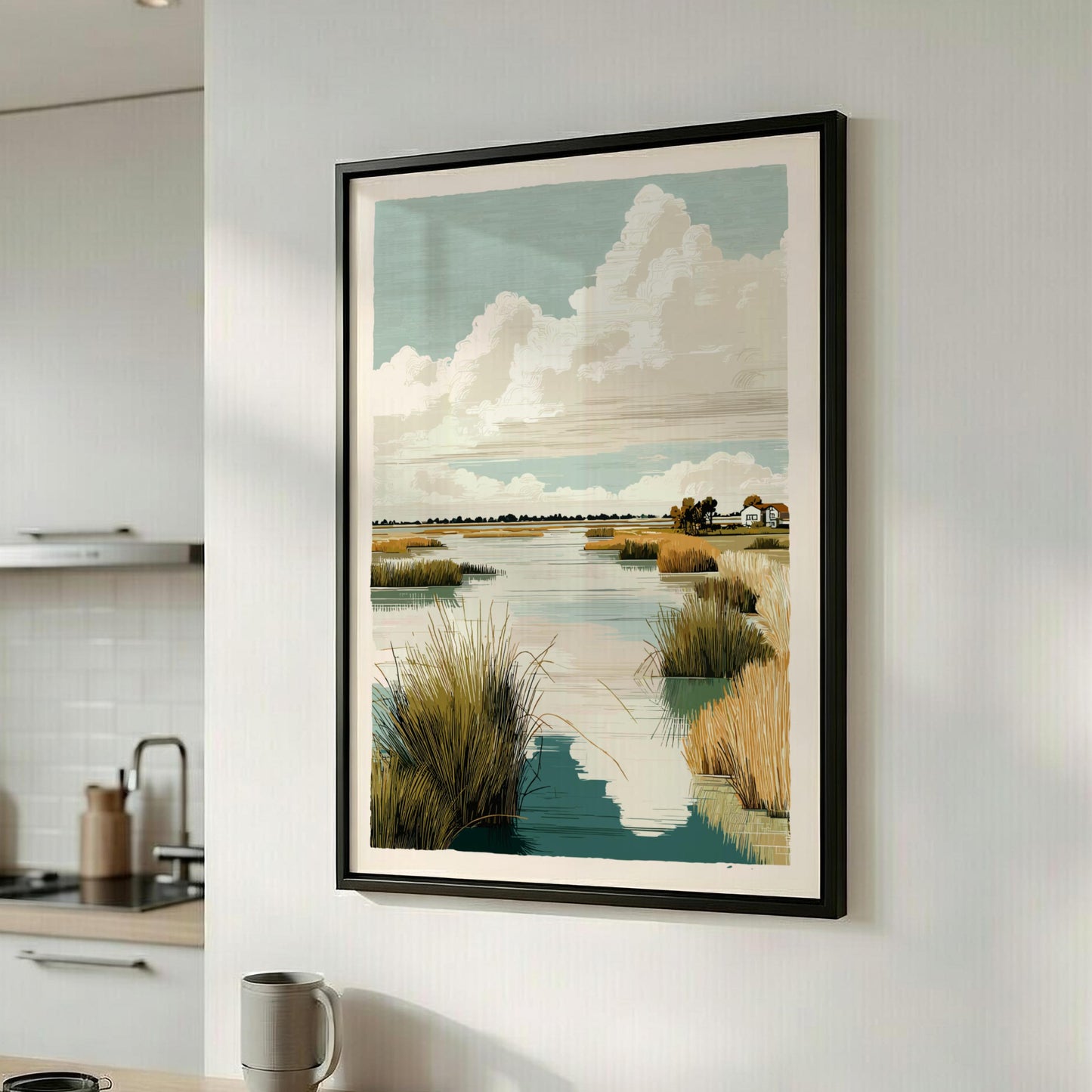 Framed landscape print of a marsh scene with clouds hanging on a kitchen wall.