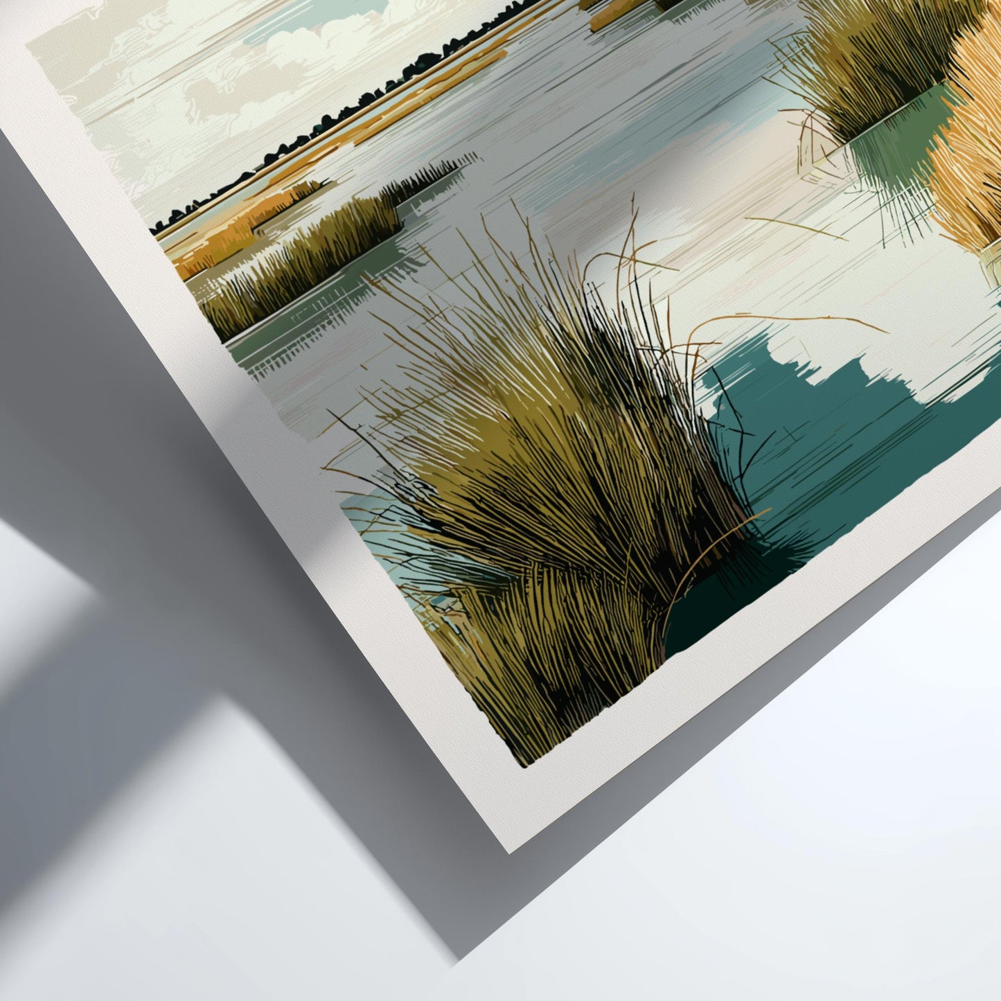 Framed artwork of a landscape with grasses and water on a white surface