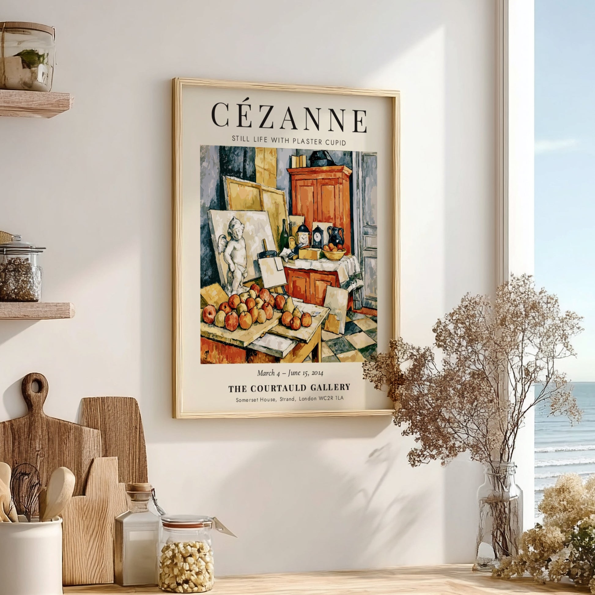 Cézanne exhibition poster featuring Still Life with Plaster Cupid, showcasing warm colors and detailed fruit