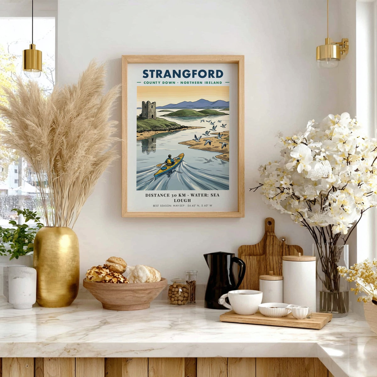 Poster of a kayaker on Strangford Lough in Northern Ireland with a stone tower.