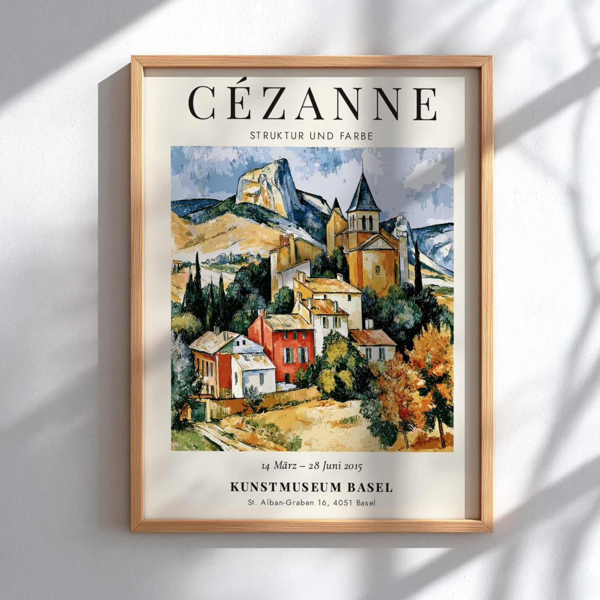 Cézanne exhibition poster featuring vibrant colors and charming landscape scene