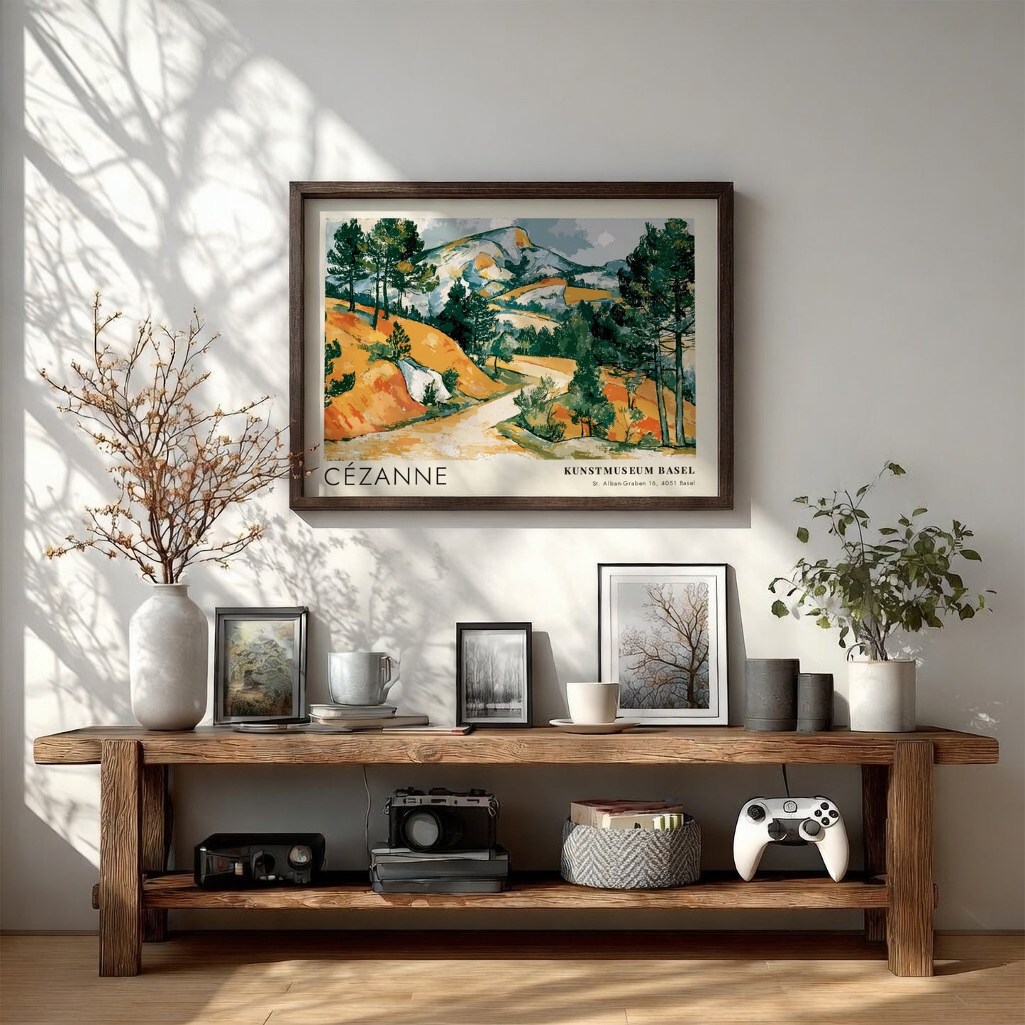 Wall art poster featuring a Cézanne landscape painting with ochre hills and green pines.