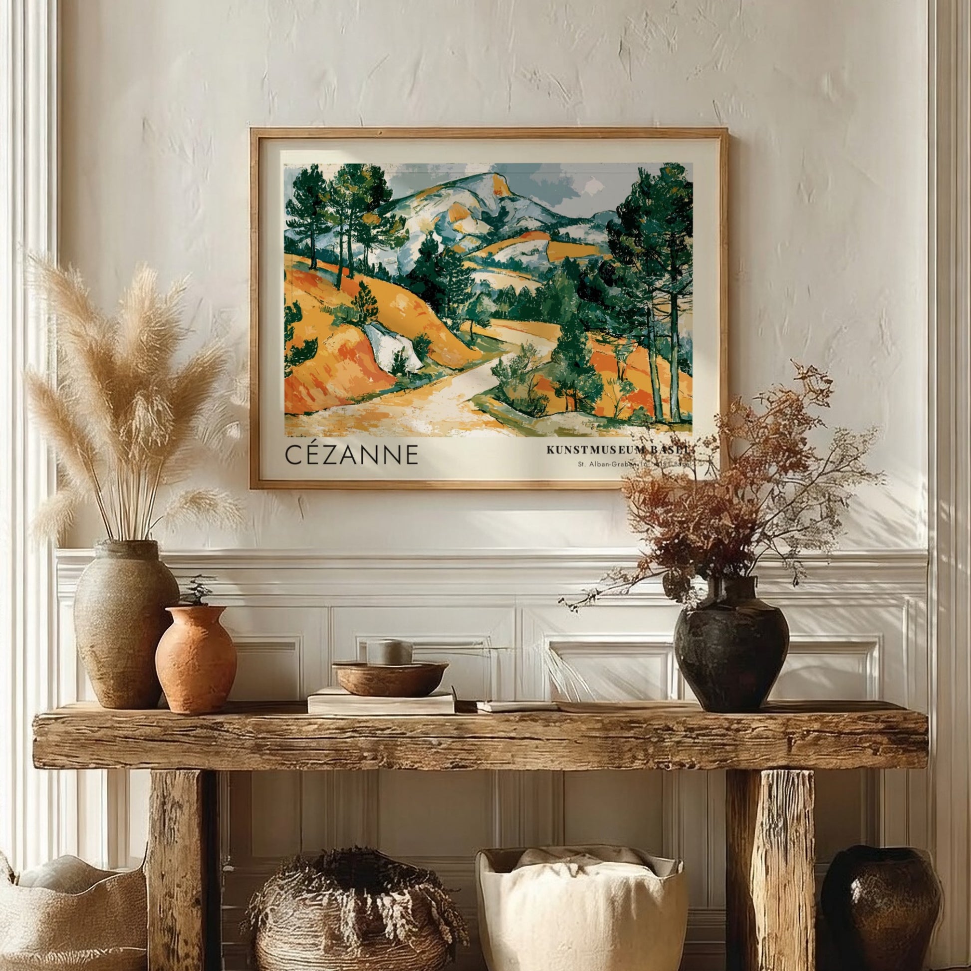 Wall art poster featuring a Cézanne landscape painting with ochre hills and green pines.
