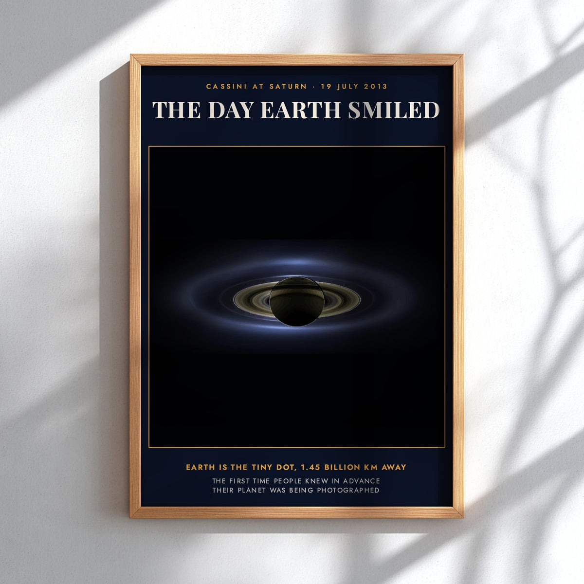 Poster displaying the planet Saturn and its rings against a dark deep space background.