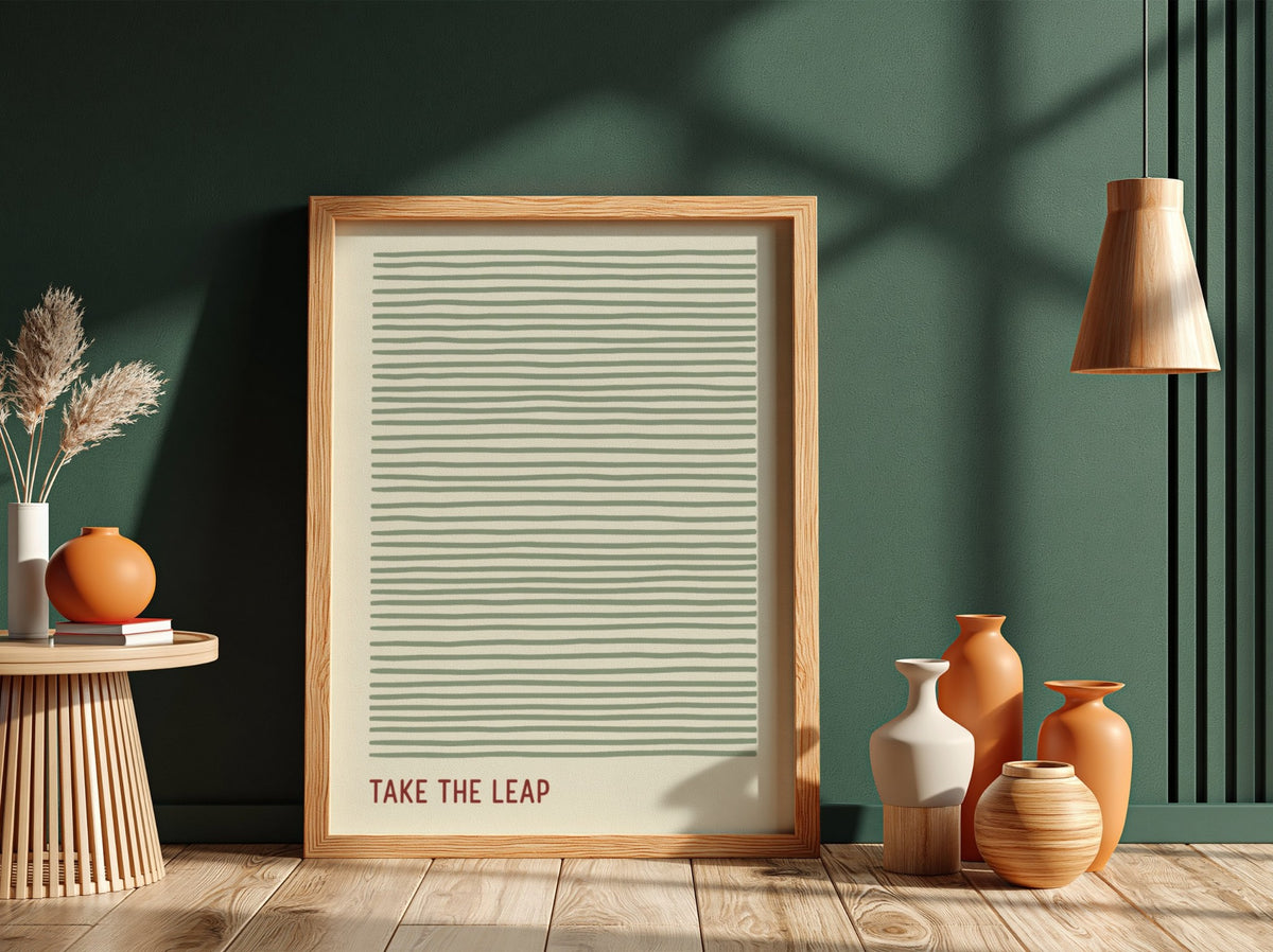 Motivational poster featuring soft sage green horizontal lines and the quote Take The Leap