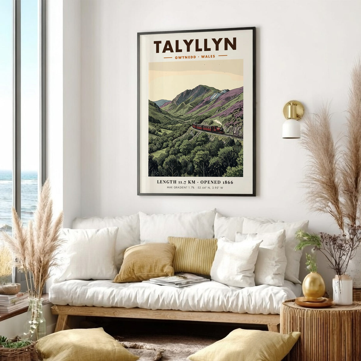 Poster of a red steam train travelling through the mountainous Talyllyn landscape in Wales.