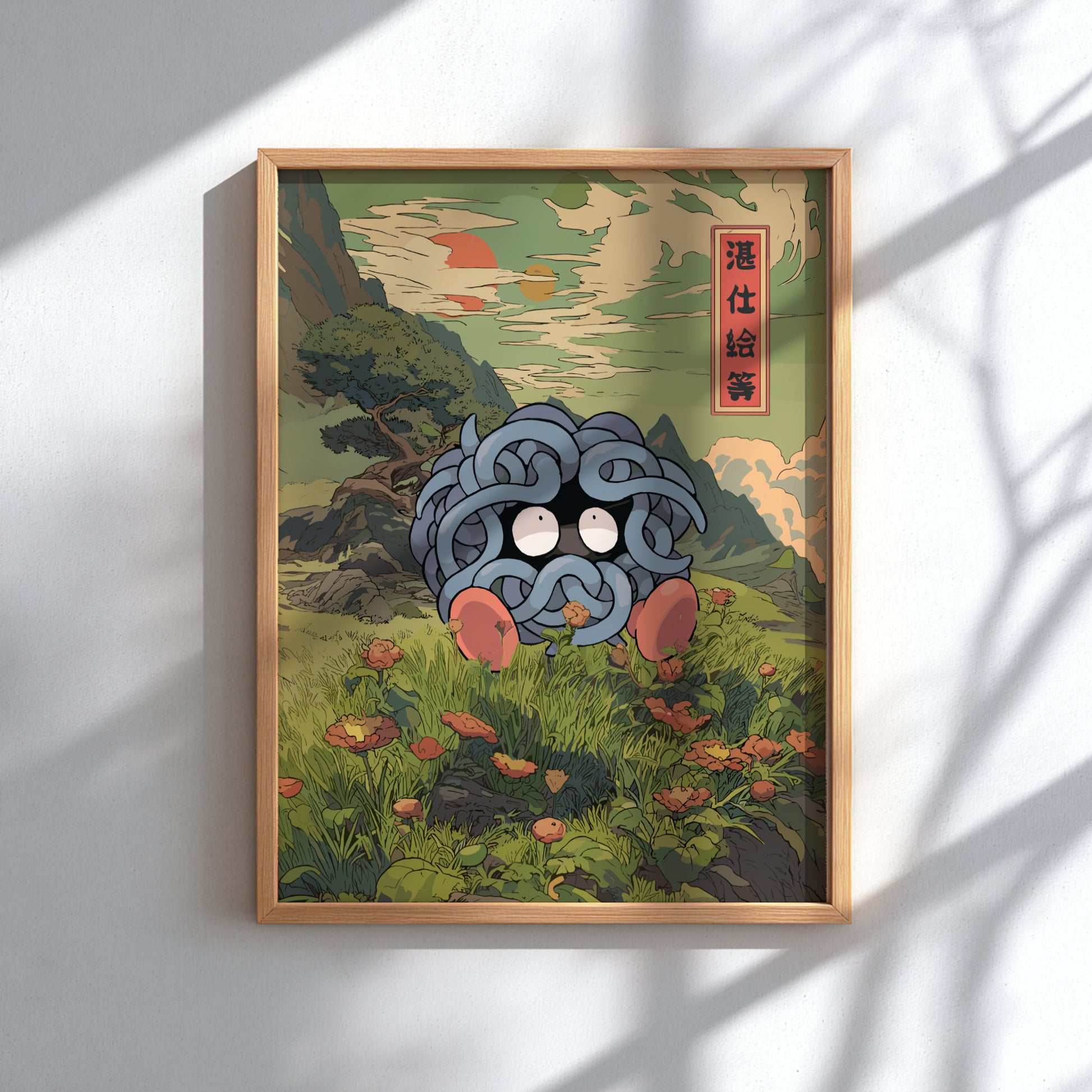 Framed artwork with a stylized Tangela Pokemon in a natural setting
