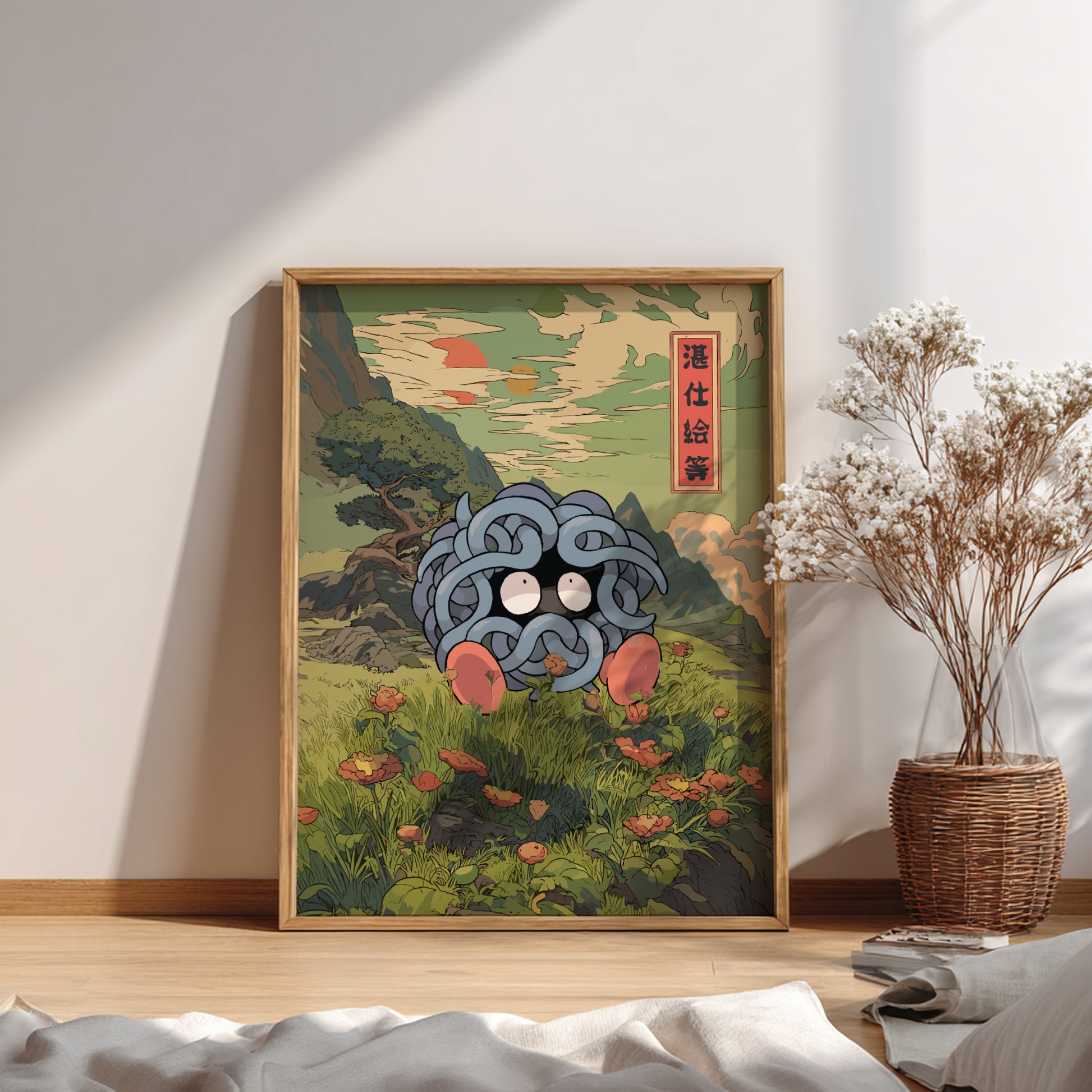 Framed artwork with a stylized Tangela Pokemon in a natural setting on a wall.
