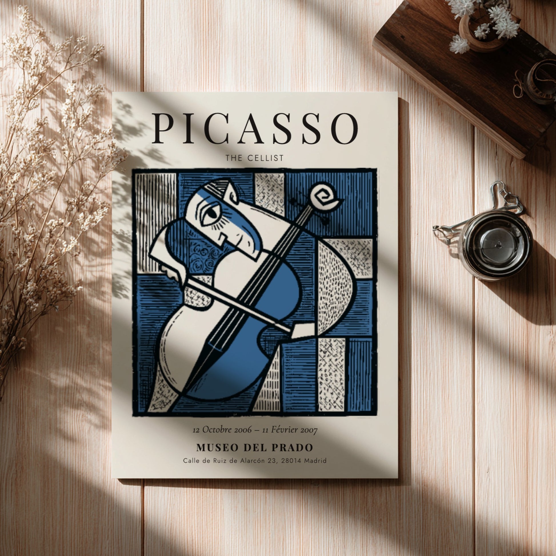 Picasso inspired poster featuring The Cellist in blue tones and abstract style