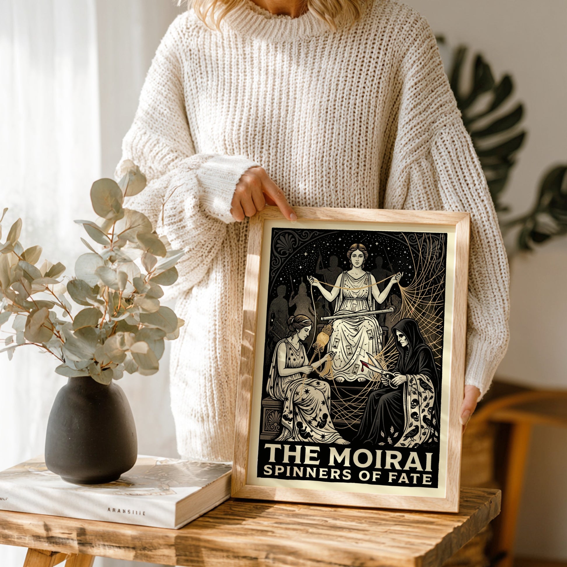 The Moirai poster depicting the three Fates spinning, measuring, and cutting the thread of life in a dramatic