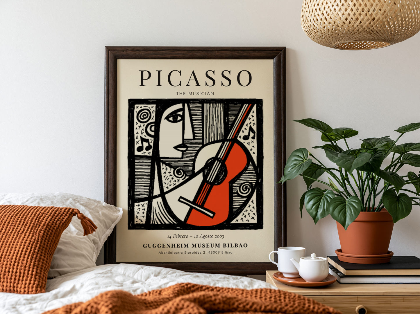 Picasso inspired poster featuring a musician with guitar in monochrome style